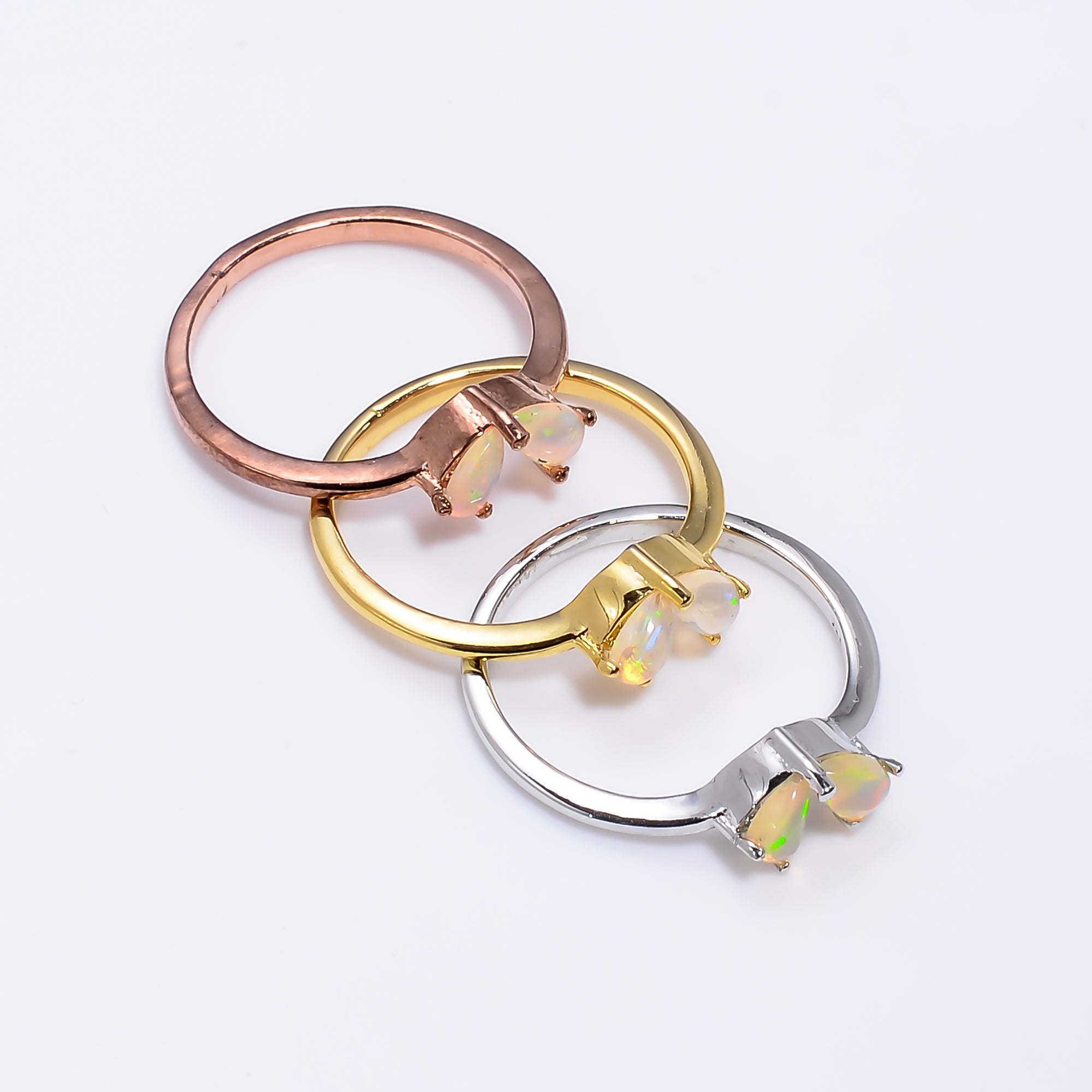 Ethiopian Opal ring with 3x5mm teardrop opal set in 925 sterling silver, handmade minimalist design for women.