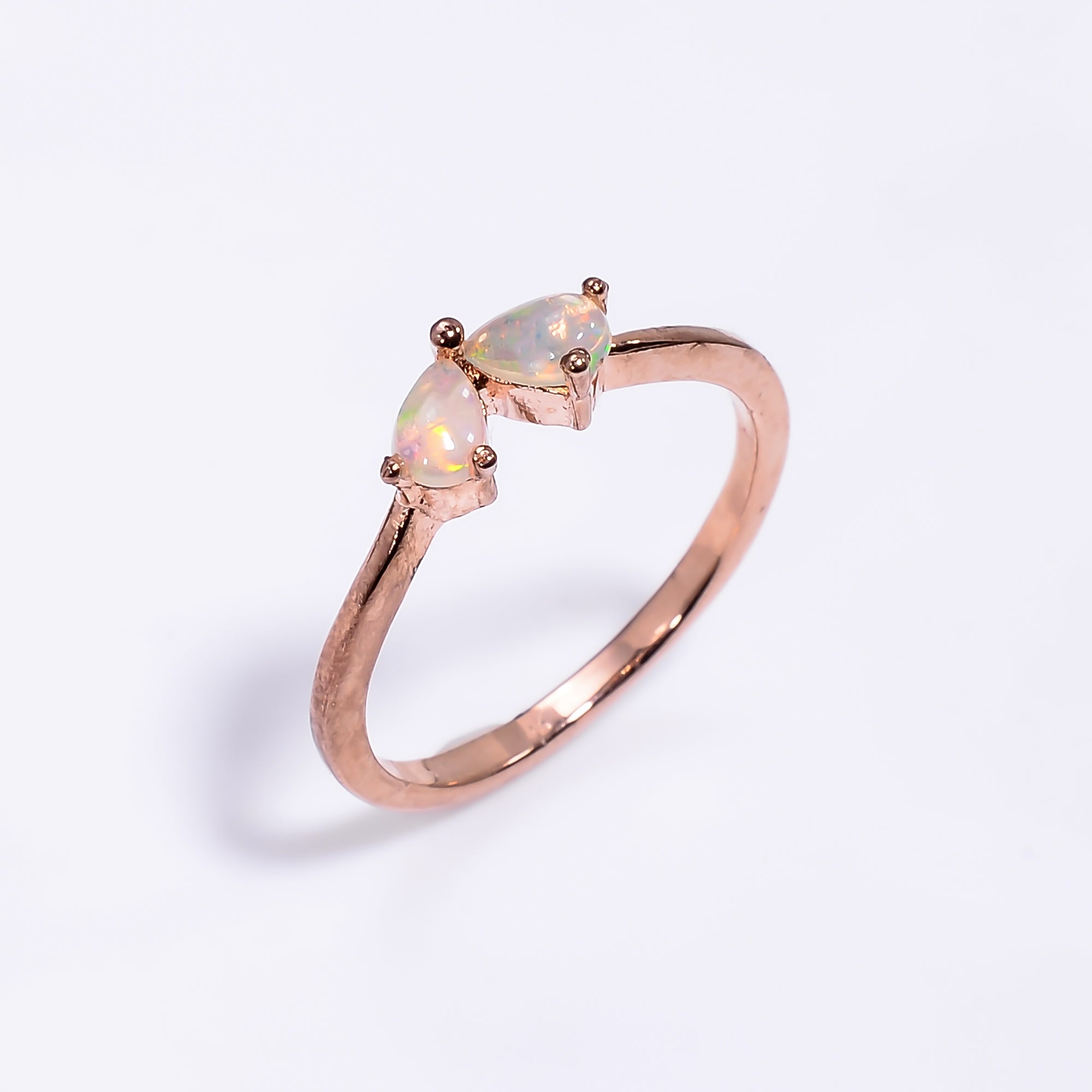 Ethiopian opal ring with 3x5mm teardrop opal in sterling silver, handmade minimalist design for women by Himalya Quartz.