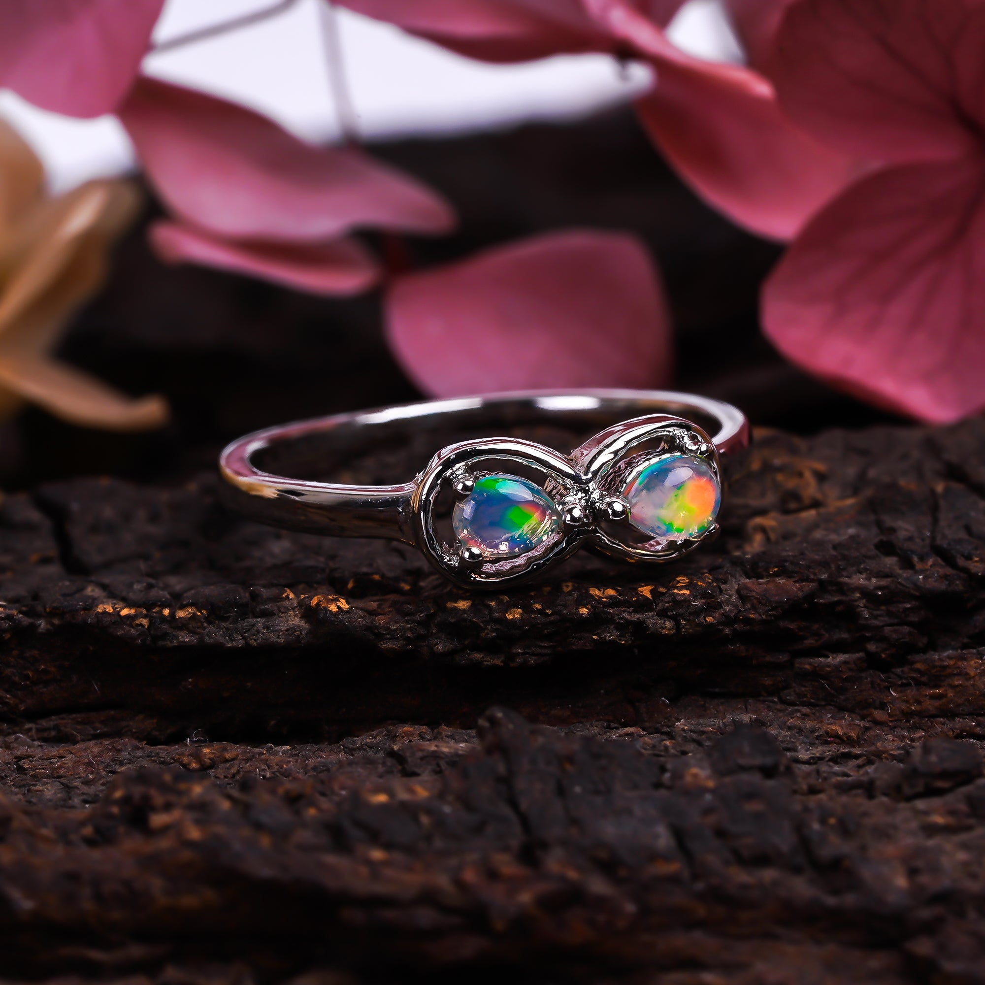 Natural Ethiopian Opal pear-shaped ring in 925 sterling silver, featuring a 3x4mm opal gemstone for women.
