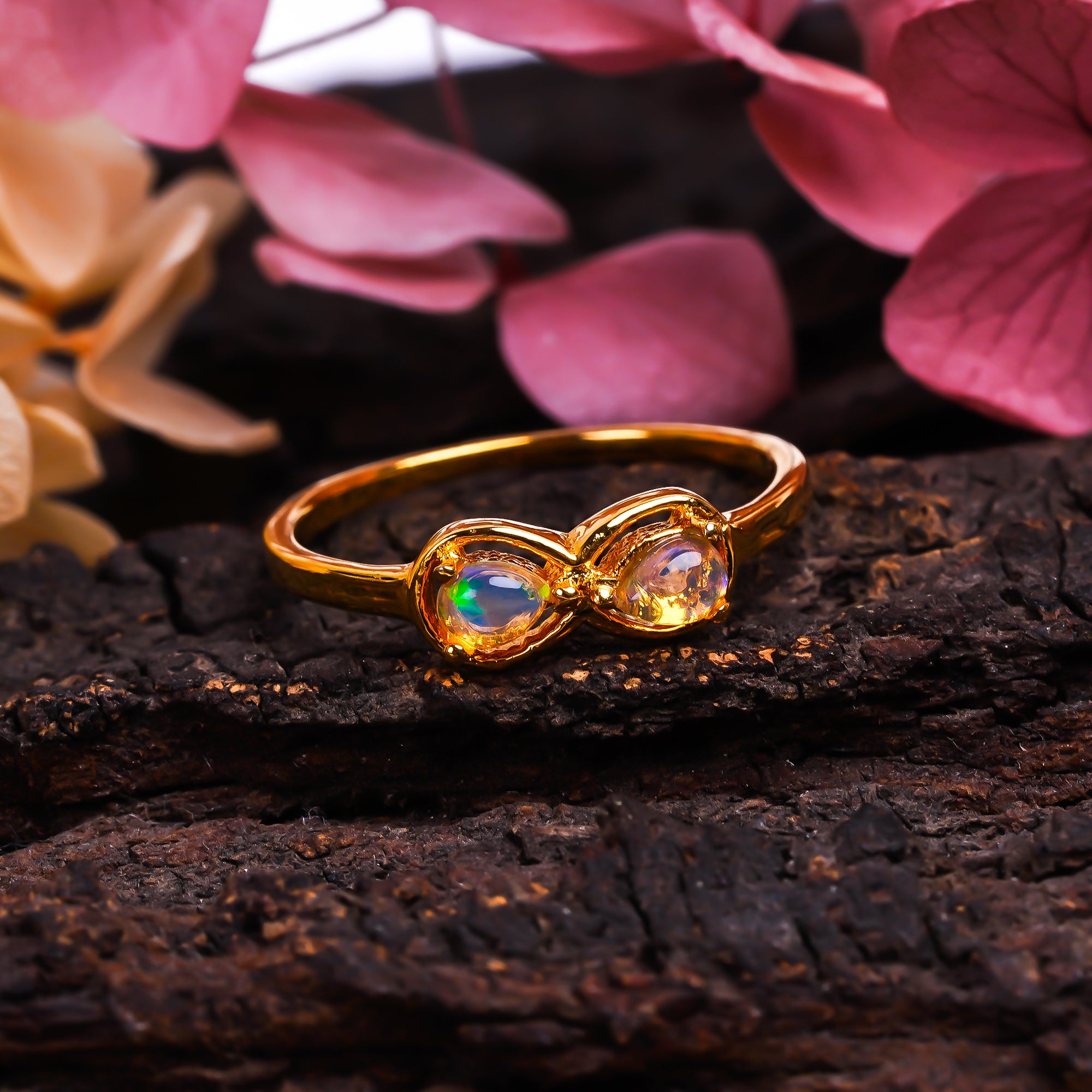 Natural Ethiopian Opal pear ring in 925 sterling silver with 3x4mm opal, designed for women, by Himalya Quartz.