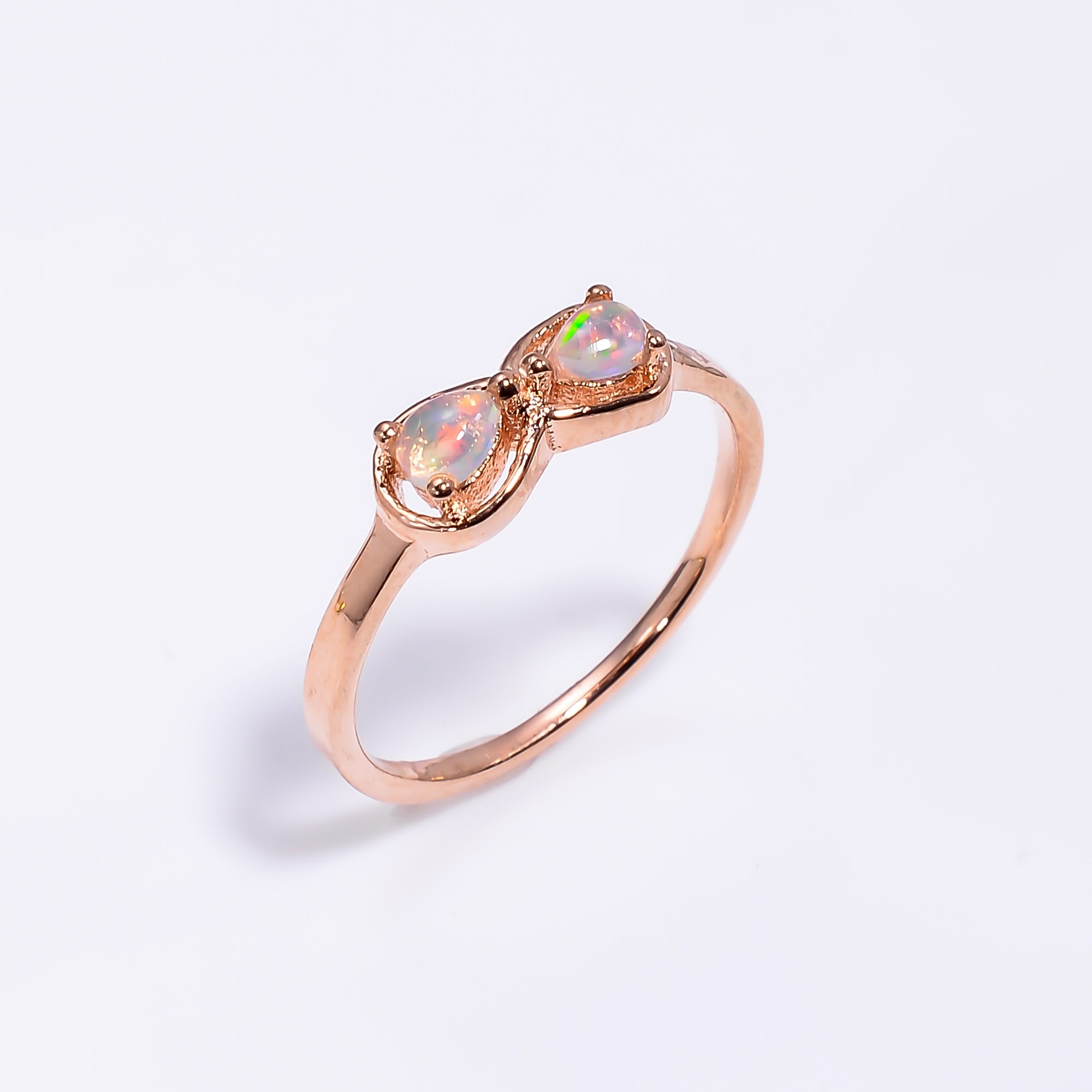 Natural Ethiopian opal pear ring in 925 sterling silver featuring a 3x4mm opal, elegant jewelry for women by Himalya Quartz.
