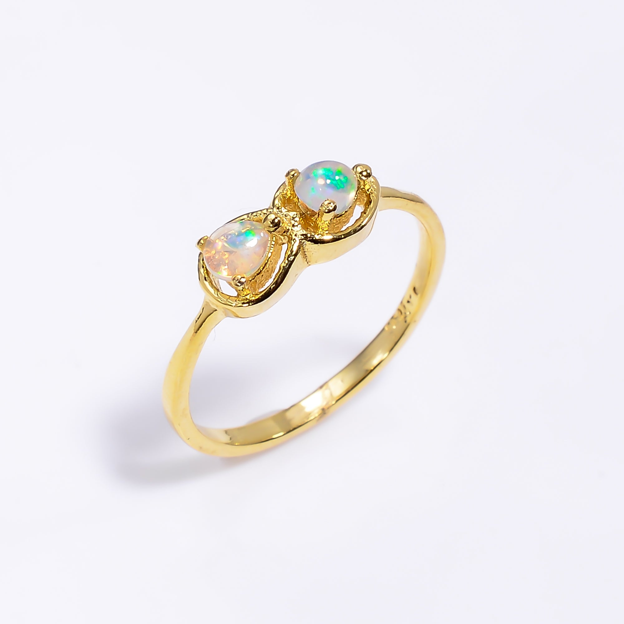 Pear cut Ethiopian opal ring in 925 sterling silver with a 3x4mm opal, handmade jewelry perfect for women.