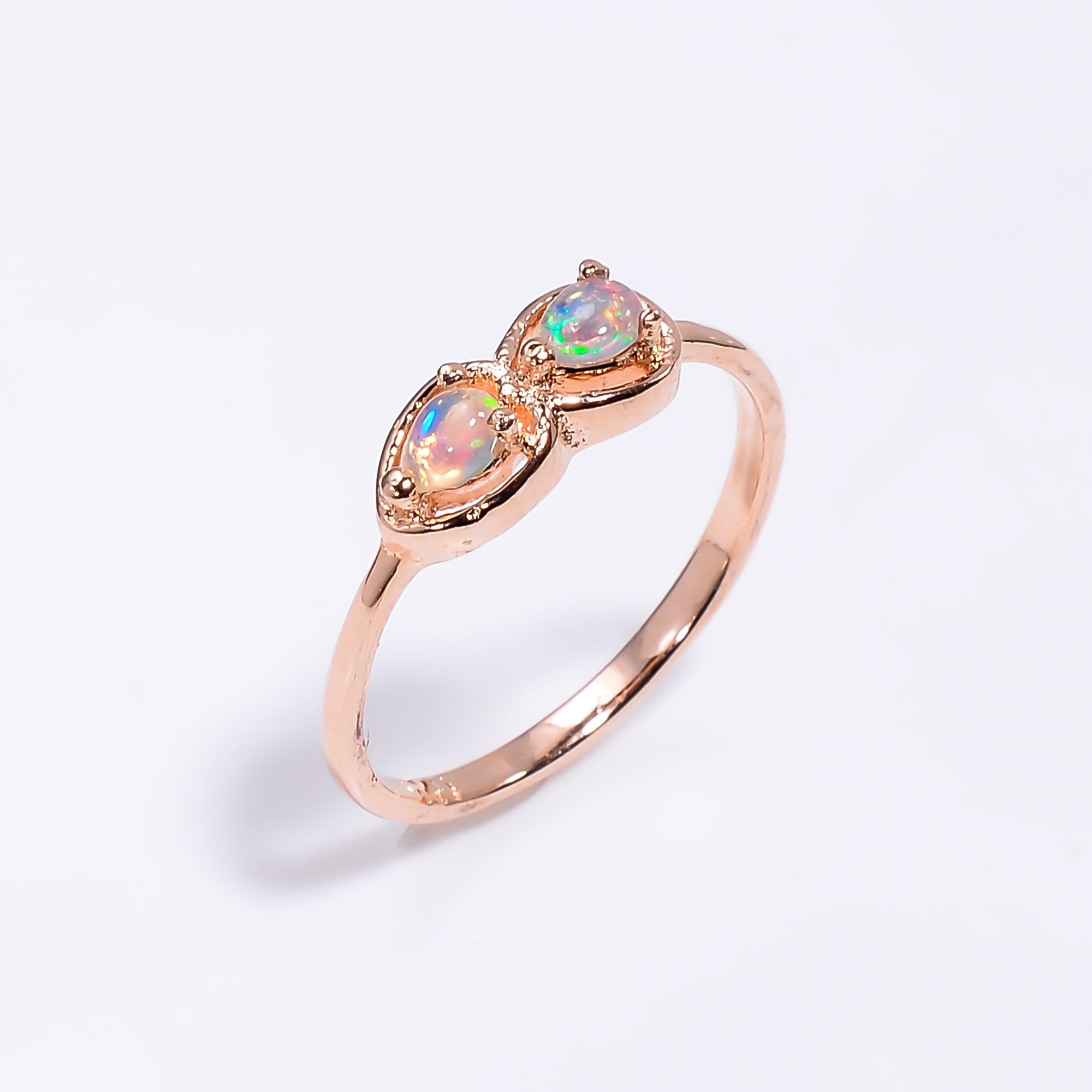 Pear cut Ethiopian opal ring in 925 sterling silver with a 3x4mm opal, handcrafted jewelry for women by Himalya Quartz.