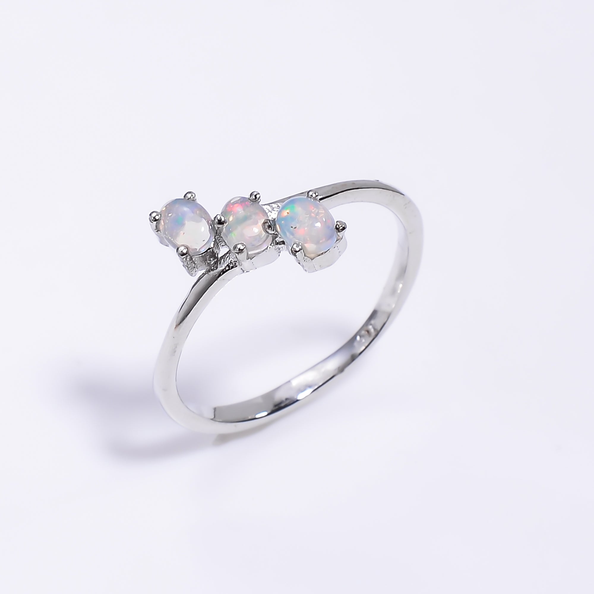 Natural Ethiopian opal oval ring in 925 sterling silver with a 3x4mm gemstone, minimalist handmade jewelry for women.