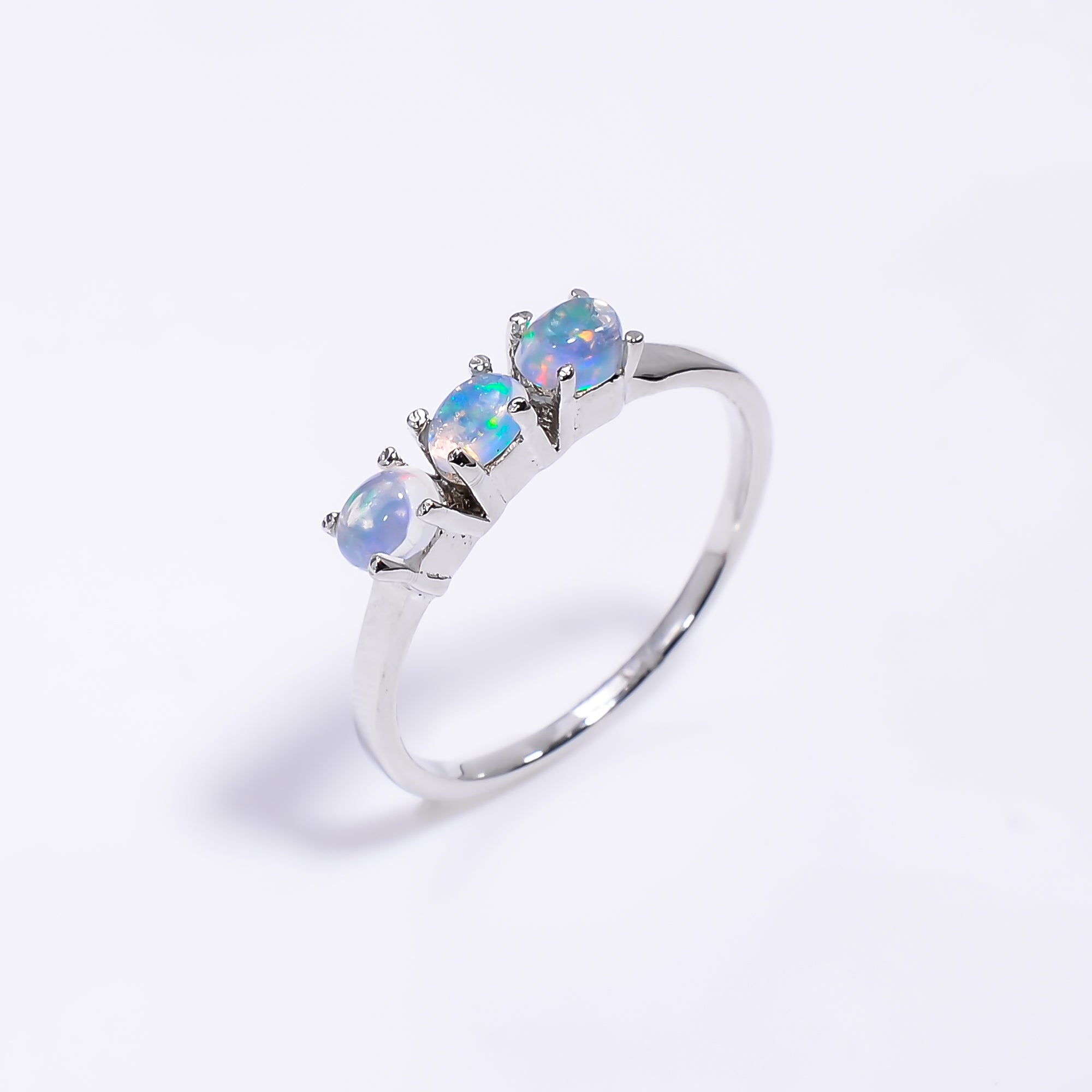 Oval Ethiopian Opal ring in 925 sterling silver with a 3x4mm natural opal, handmade women's opal ring by Himalya Quartz.