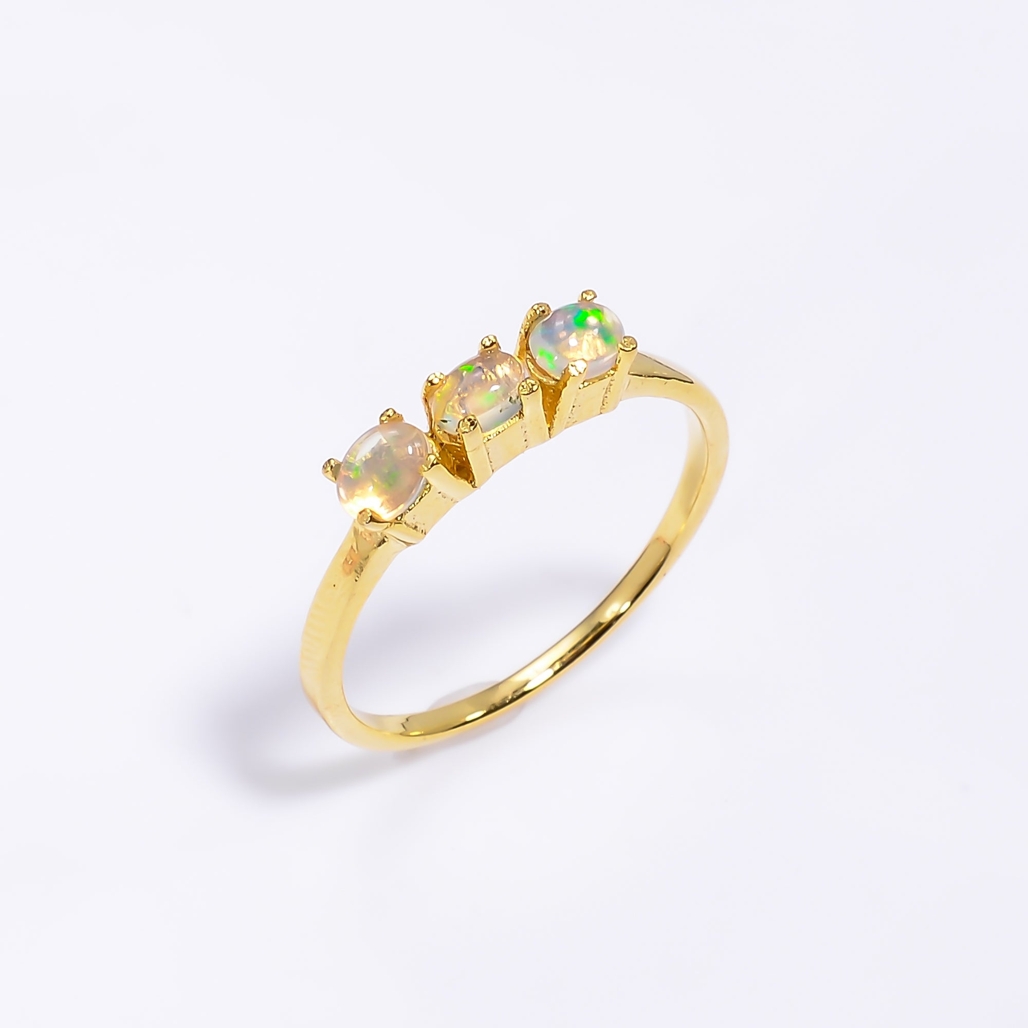 Oval Ethiopian opal ring in 925 sterling silver with a 3x4mm natural opal, handcrafted jewelry for women by Himalya Quartz.