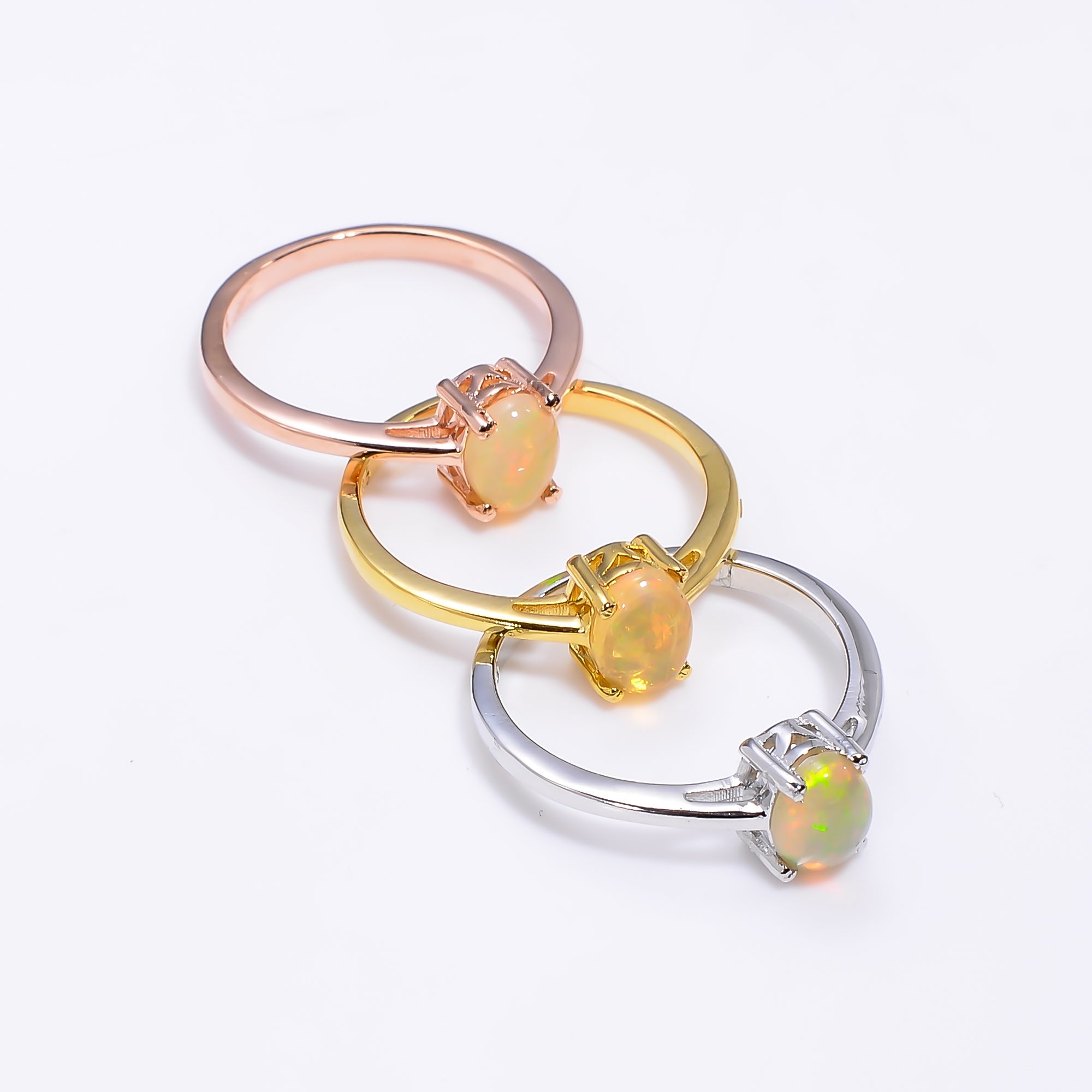 Oval Ethiopian Opal ring in 925 sterling silver with a 7x5mm natural handmade opal, designed for women by Himalya Quartz.