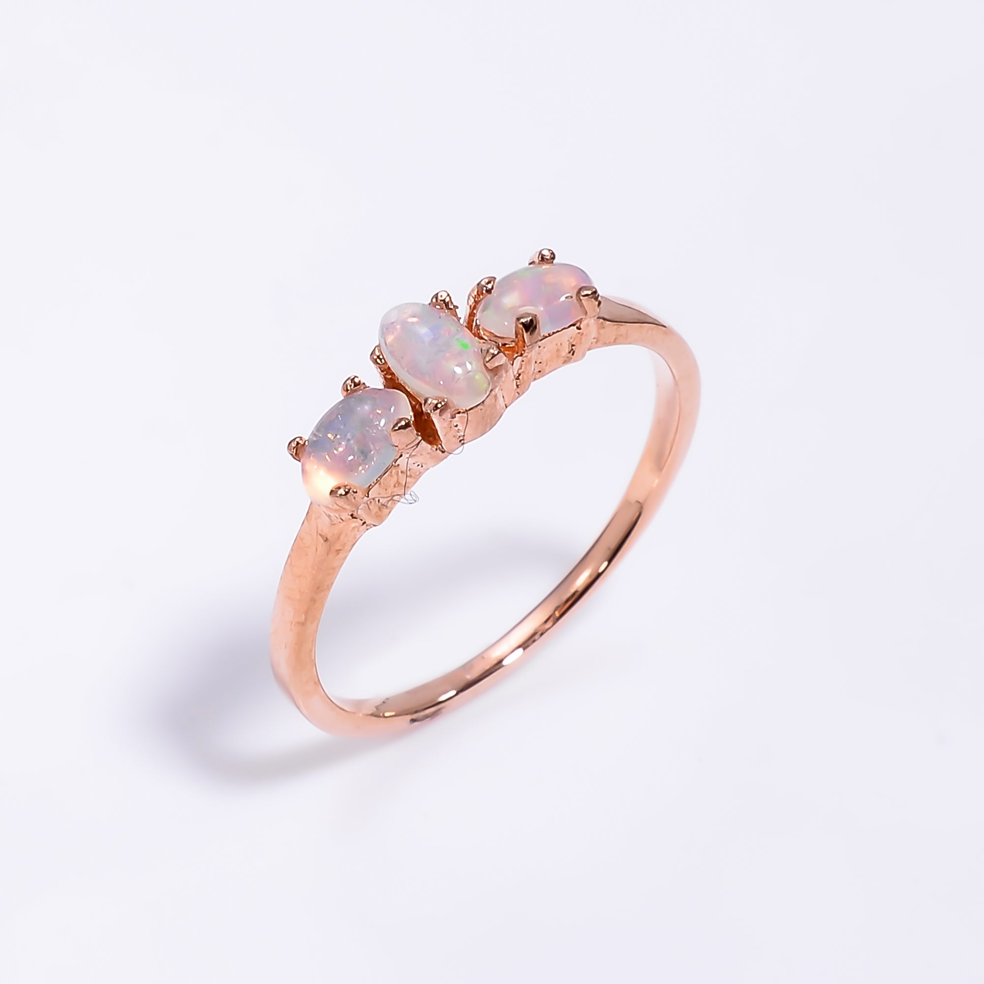 Oval opal ring in 925 sterling silver with 3x5mm opal, handmade jewelry for women featuring a sleek, elegant design.