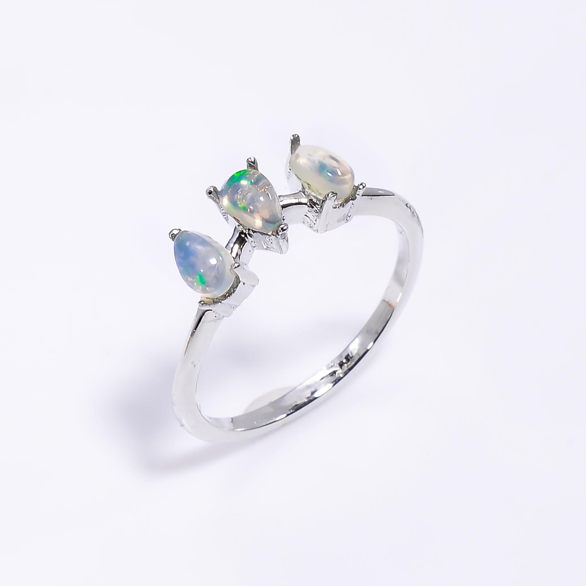 Ethiopian opal ring in 925 sterling silver with a 3x5mm opal, featuring a sleek design perfect for women’s jewelry.