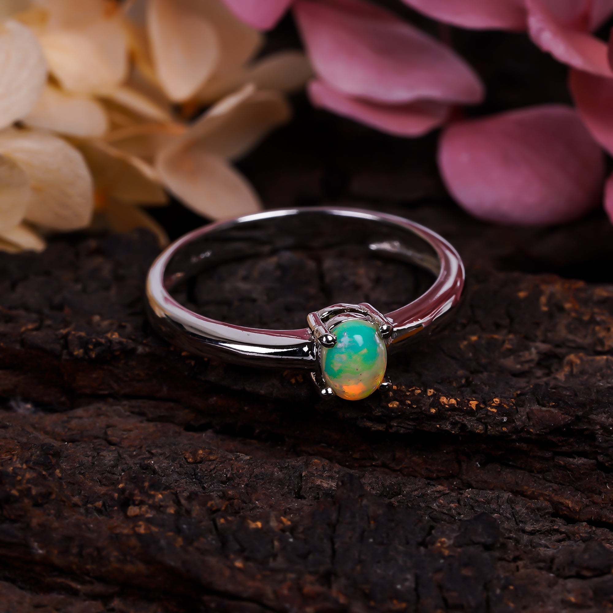 Oval Ethiopian Opal ring in 925 sterling silver with a 3x5mm opal, handcrafted jewelry for women by Himalya Quartz.