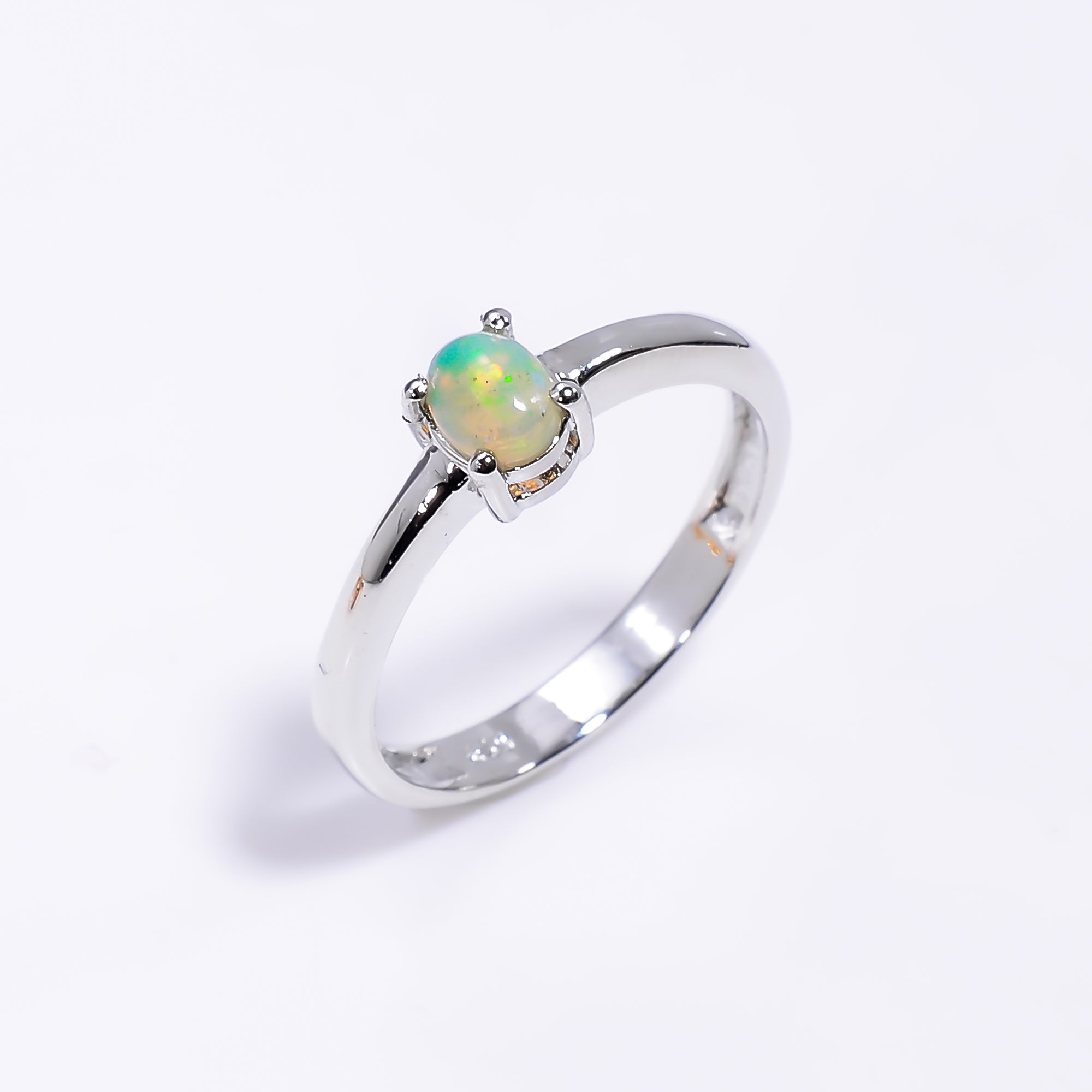 Oval Ethiopian Opal ring in 925 sterling silver with a 3x5mm opal, handcrafted jewelry for women by Himalya Quartz.