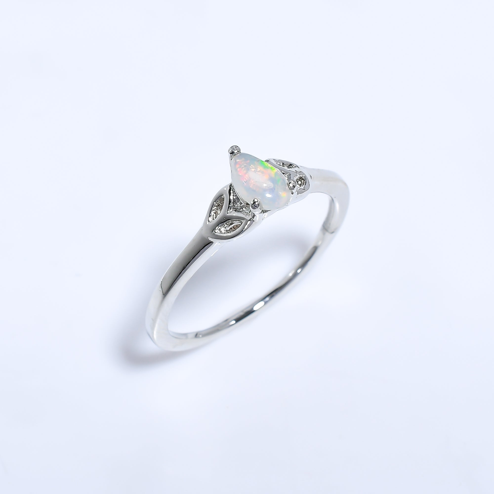 Natural Ethiopian opal 4x6mm stud earrings in 925 sterling silver, featuring pear-shaped opal jewelry for women.