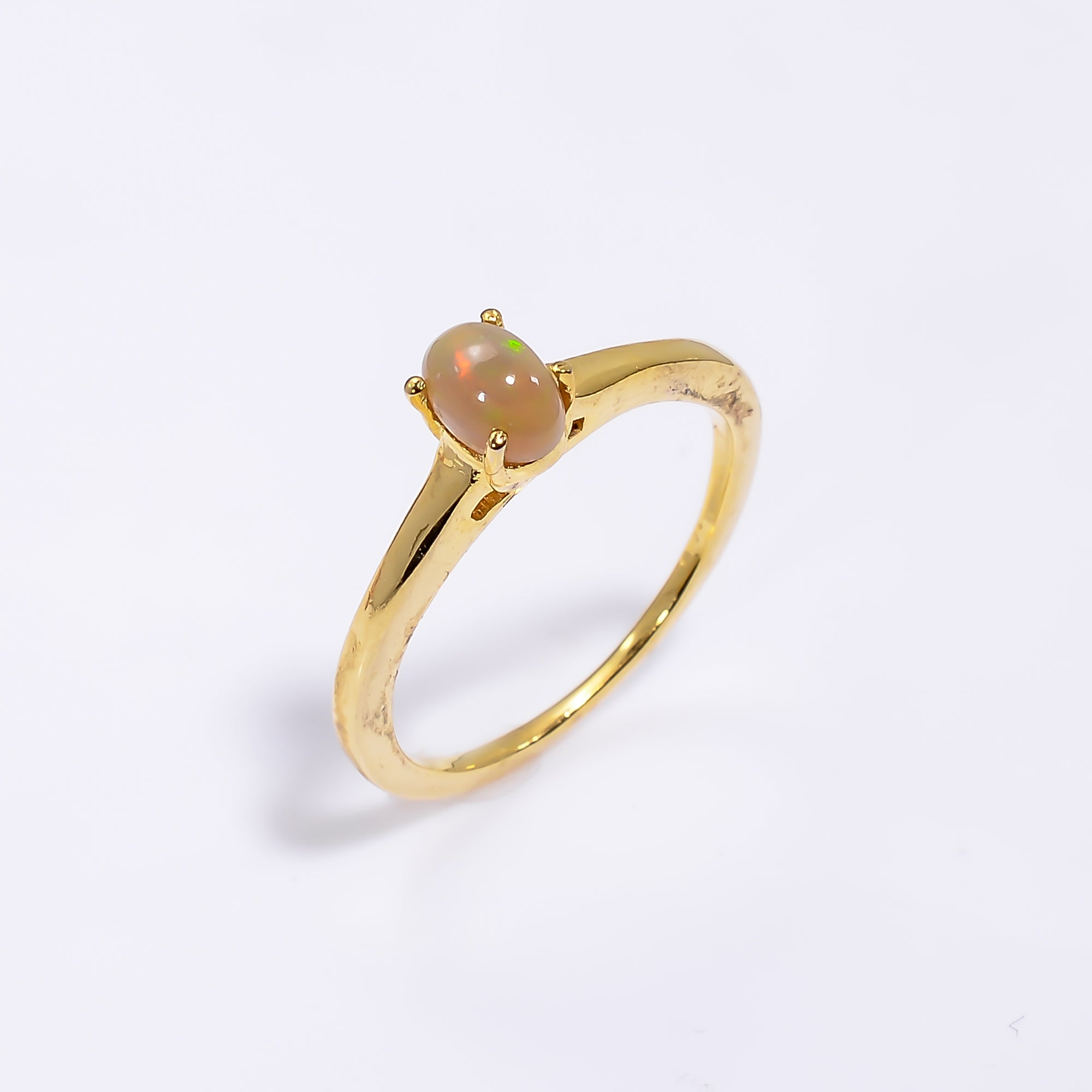 Ethiopian opal ring in 925 sterling silver with a 4x6mm oval opal gemstone, designed for women by Himalya Quartz.