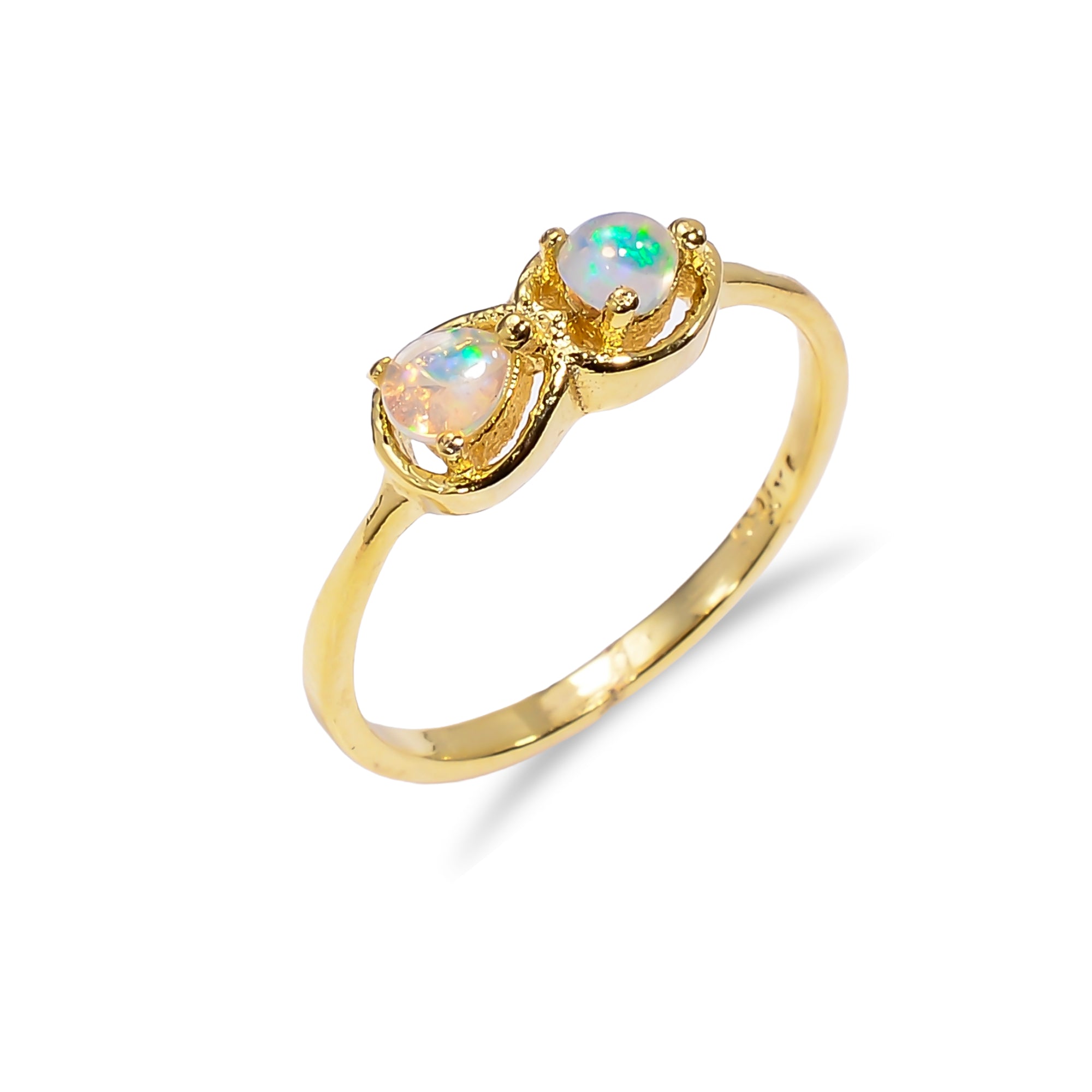 Pear cut Ethiopian Opal ring in sterling silver with a 3x4mm opal, handcrafted jewelry designed for women.