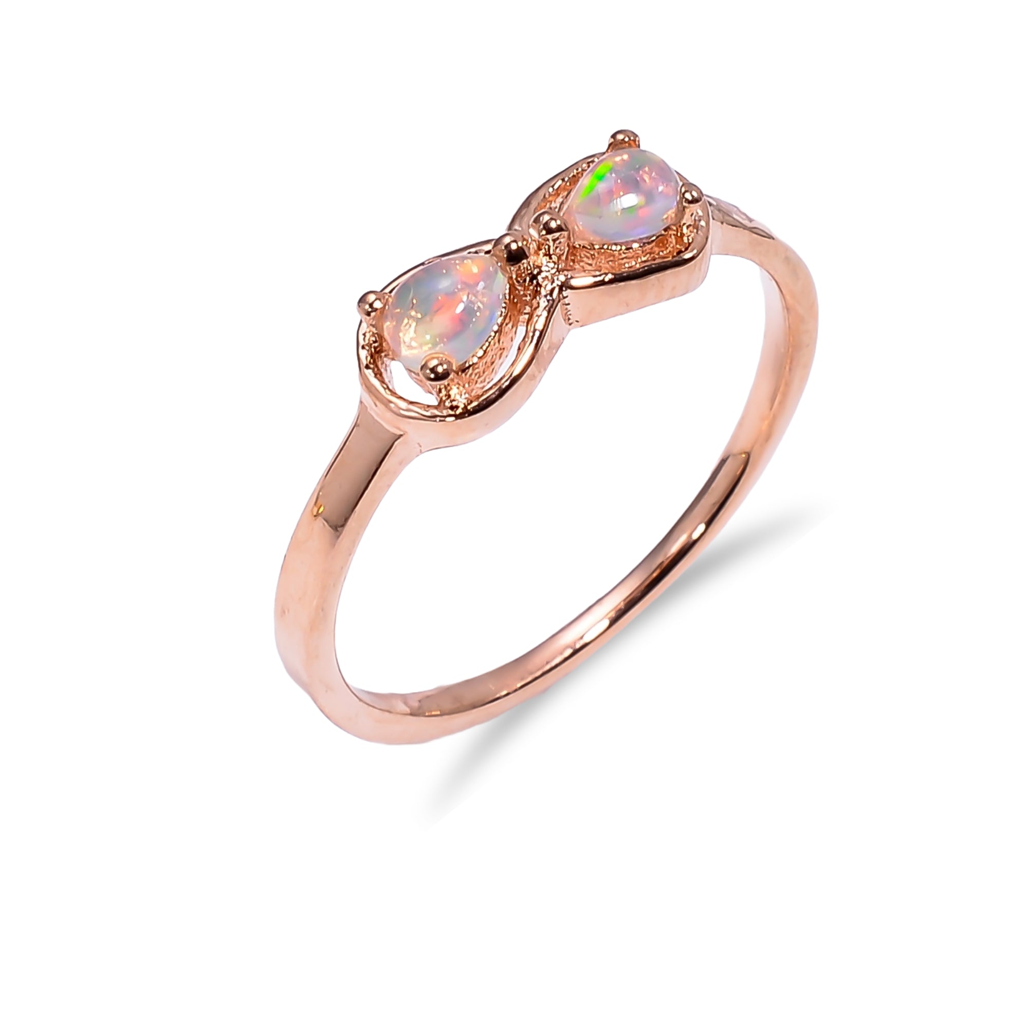 Sterling silver Ethiopian opal pear ring with 3x4mm opal for women, featuring a polished, elegant design by Himalya Quartz.