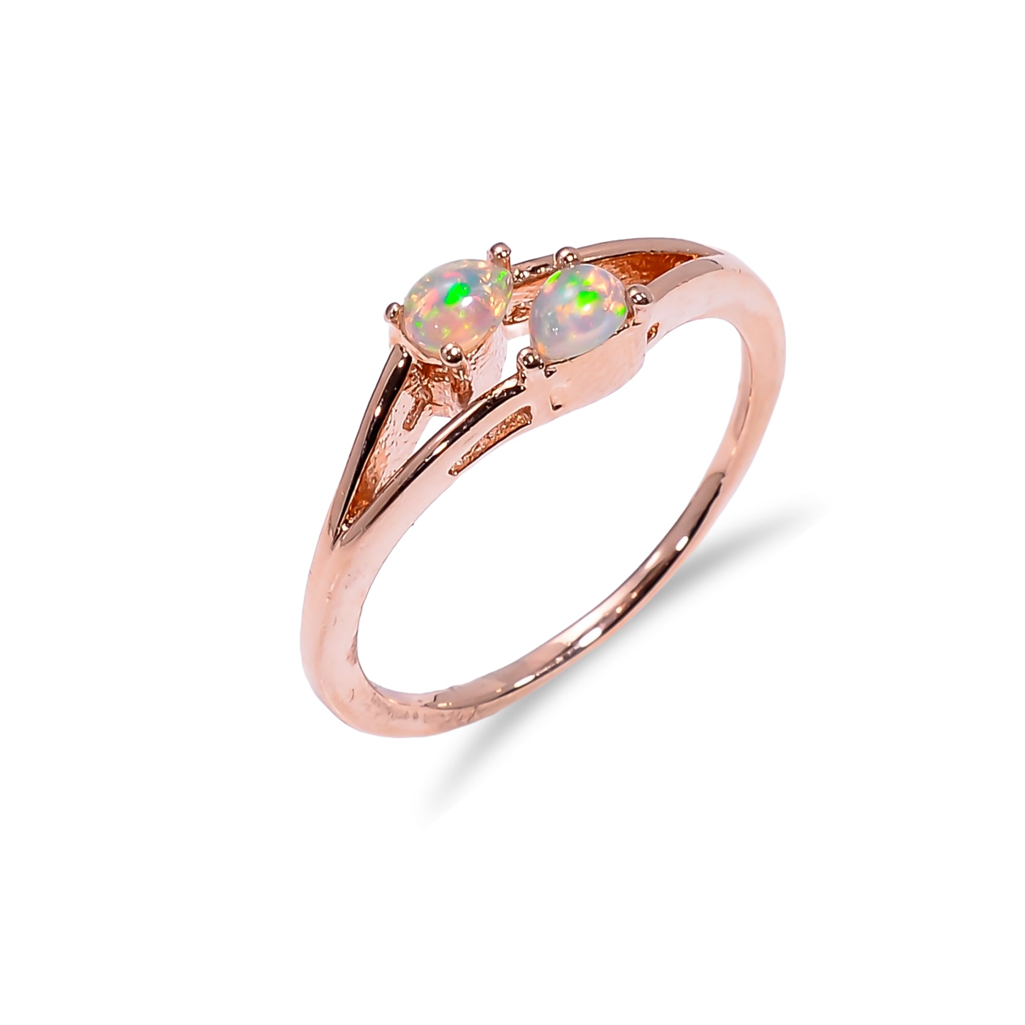 Sterling silver Ethiopian Opal ring with a 3x4mm pear-shaped fire opal, minimalist jewelry for women.