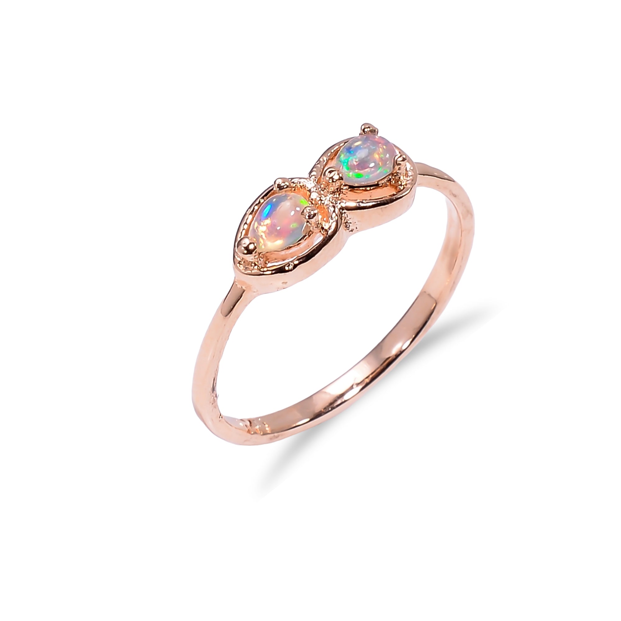 Pear cut Ethiopian opal ring in 925 sterling silver with a handmade 3x4mm opal, designed for women by Himalya Quartz.