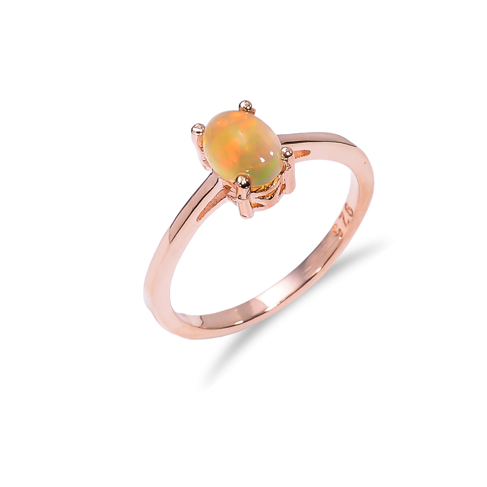 Oval Ethiopian Opal ring in 925 sterling silver with a 7x5mm natural handmade opal, designed for women.