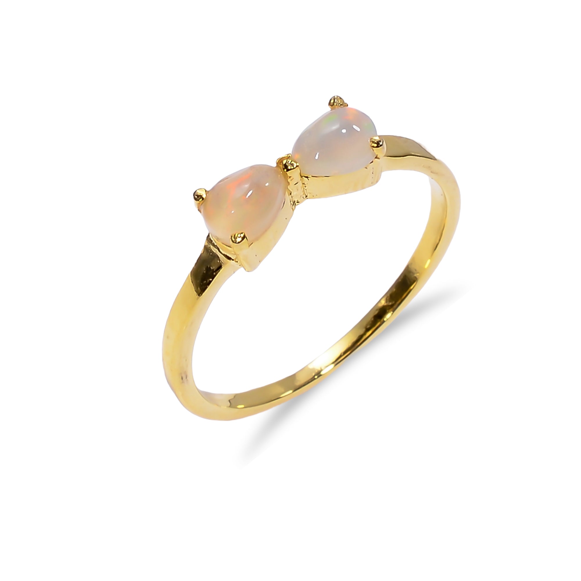 Natural Ethiopian opal ring in 925 sterling silver with a pear-shaped opal gemstone, minimalist handcrafted jewelry by Himalya Quartz.