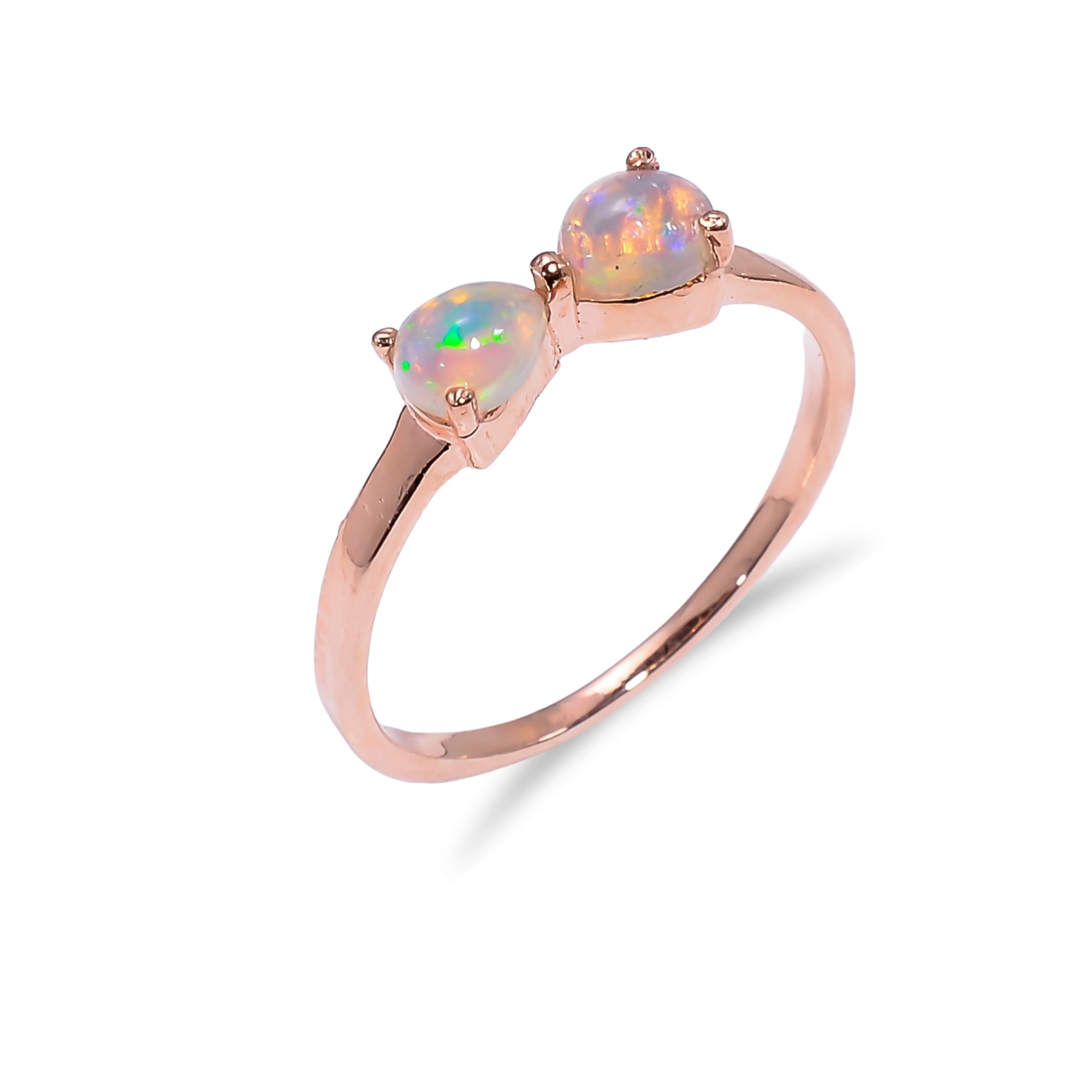 Natural Ethiopian opal ring in 925 sterling silver with a pear-shaped gemstone, minimalist handmade gemstone jewelry by Himalya Quartz