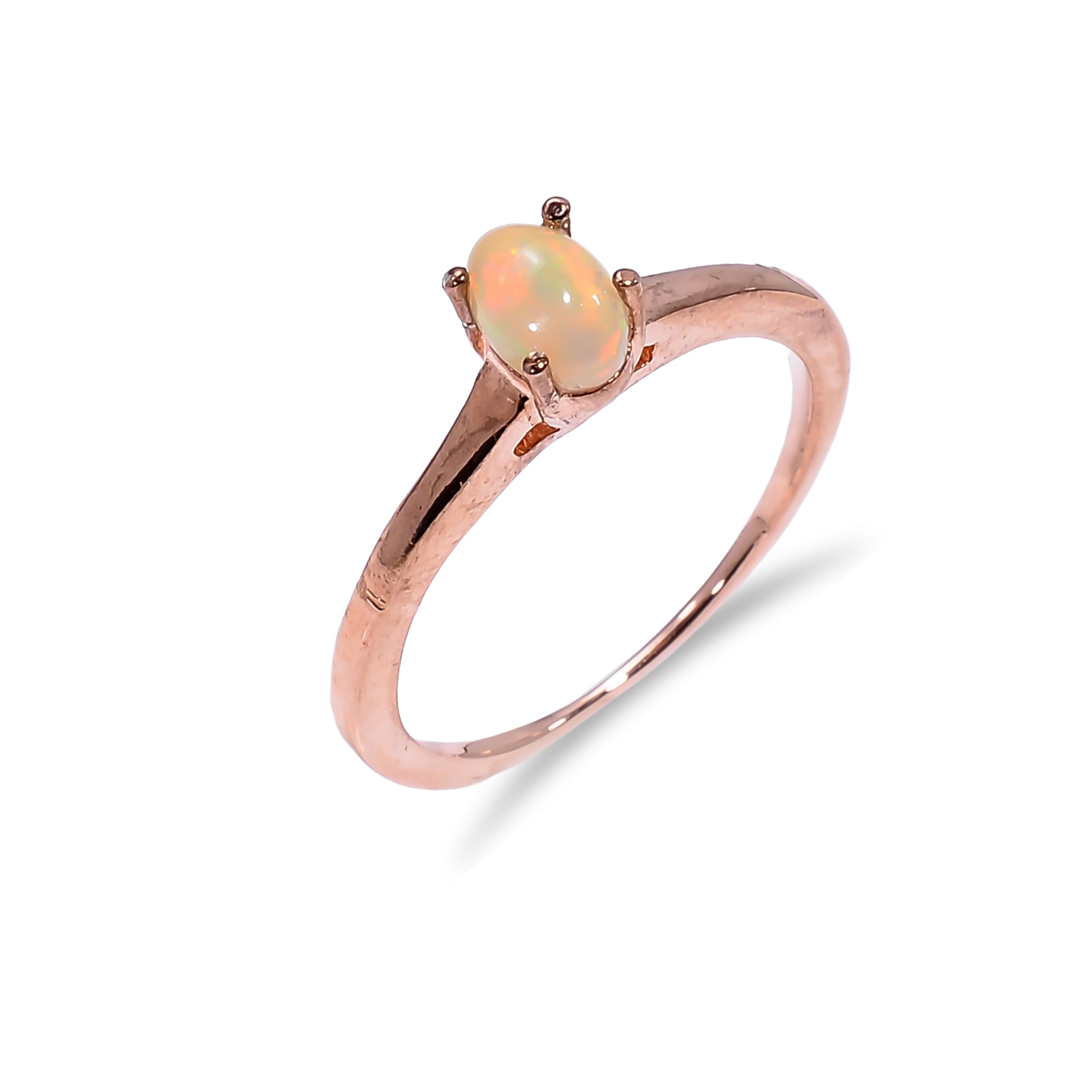 Sterling silver Ethiopian opal ring with 4x6mm oval gemstone, designed for women, by Himalya Quartz, featuring a sleek, polished band.