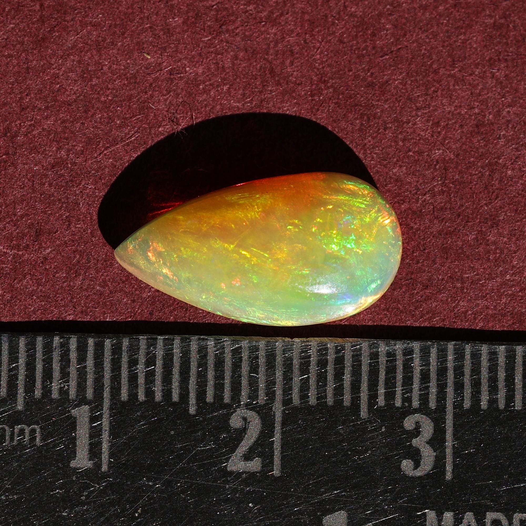 Natural AAA+ Grade White Ethiopian Opal Rainbow Fire Pear Shape Gemstones Wholesaler 4.15 Carat