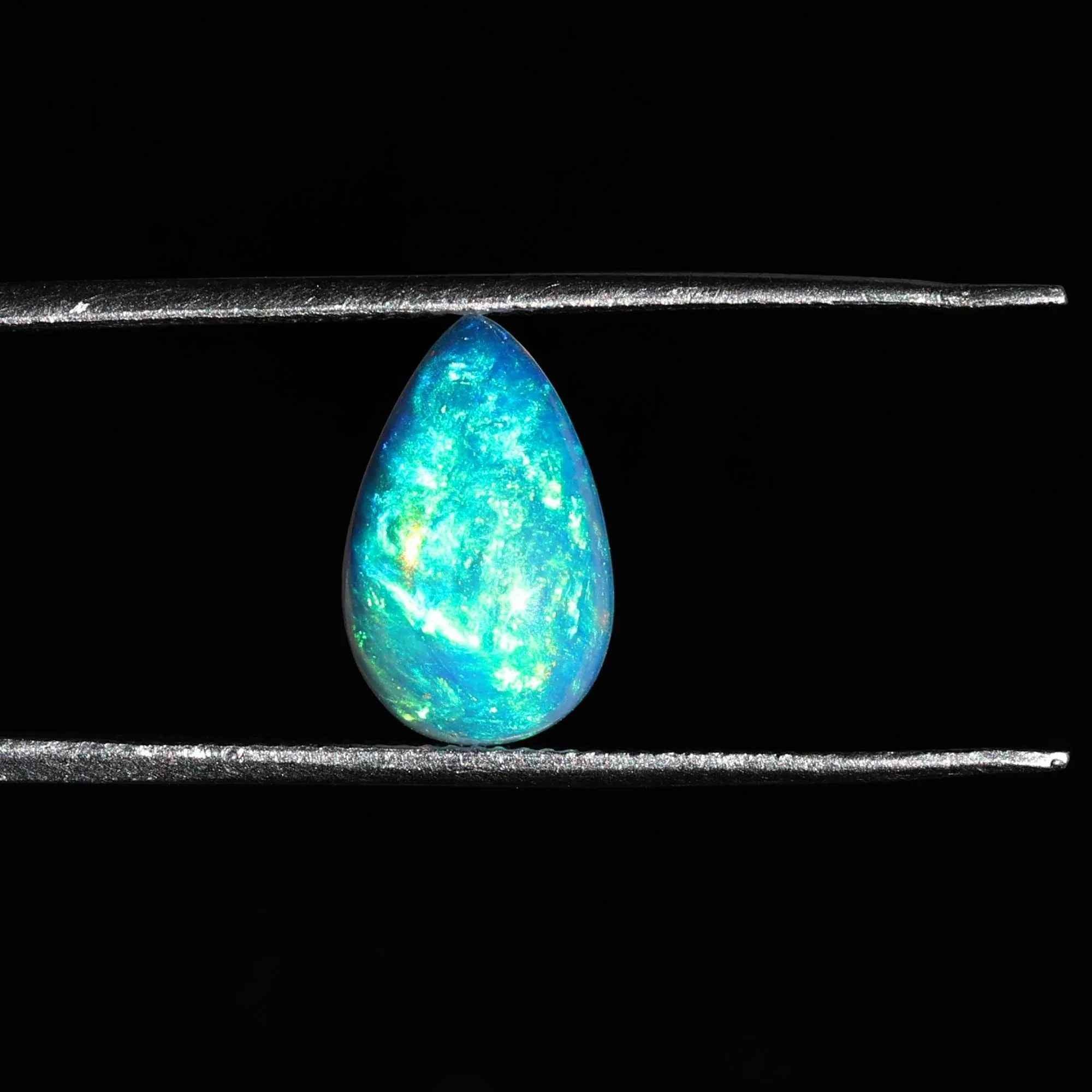 Ethiopian White Opal Cabochon: 1.25 Carat Pear-Shaped Gemstone loose gemstones