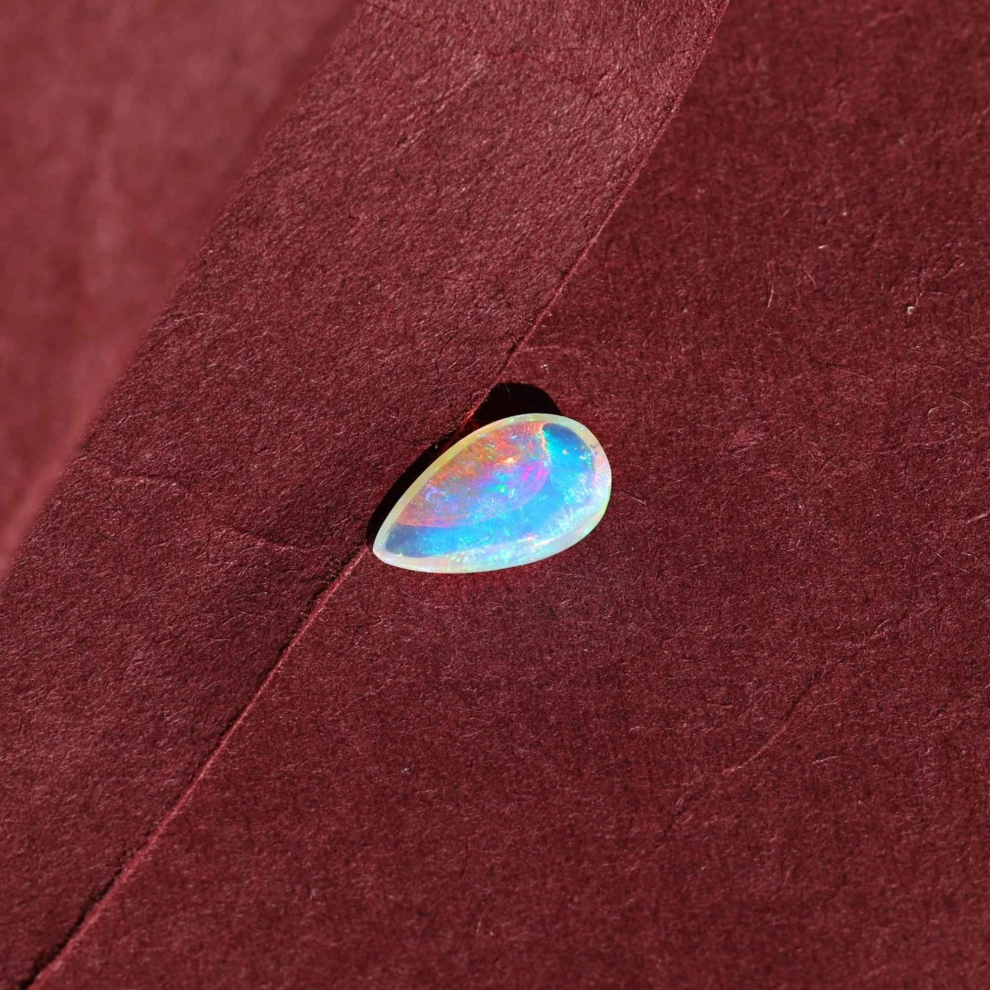 Ethiopian White Opal Cabochon: 1.25 Carat Pear-Shaped Gemstone loose gemstones