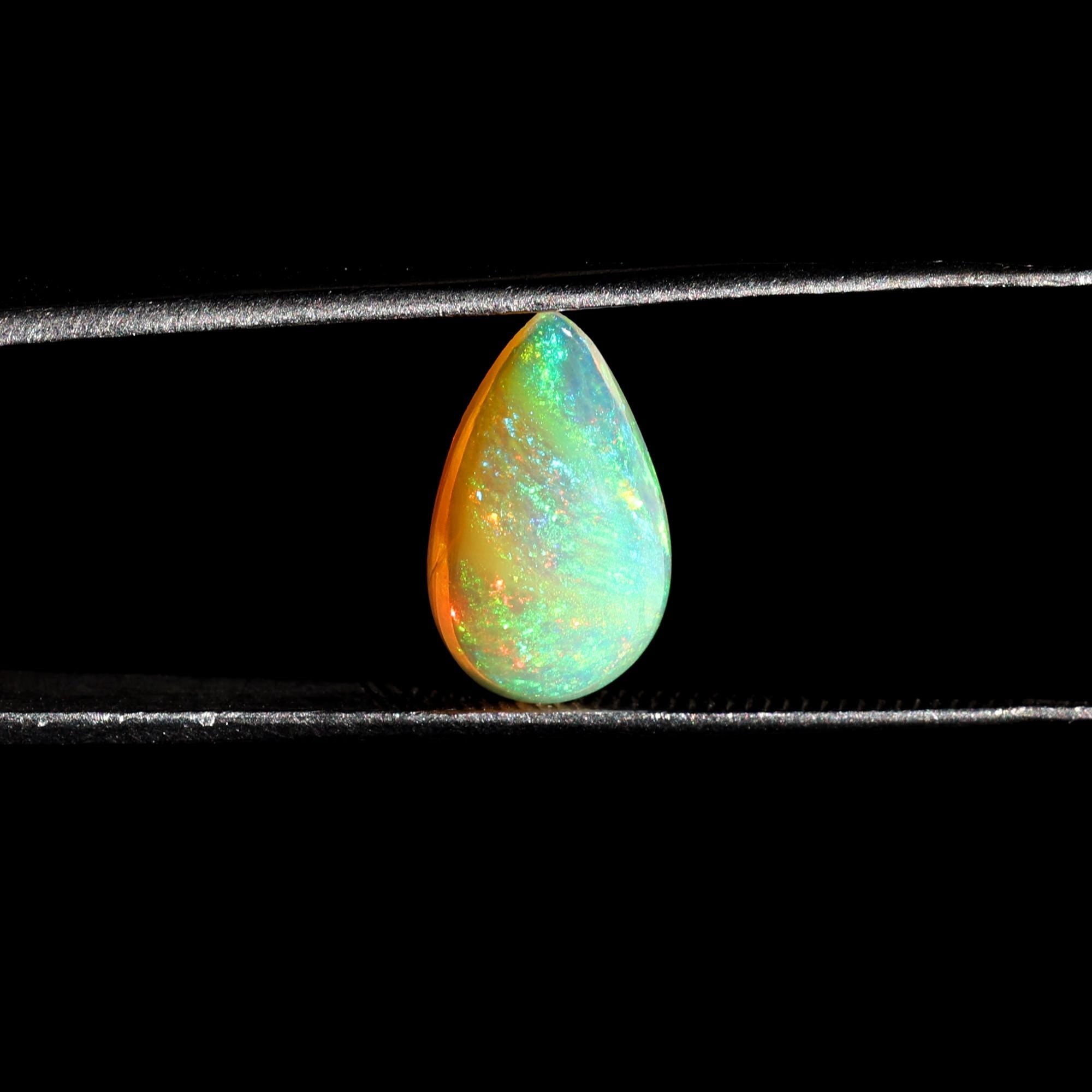 2.53 Carat Pear Shape Ethiopian Fire Opal Cabochon: Ring or Pendant Stone