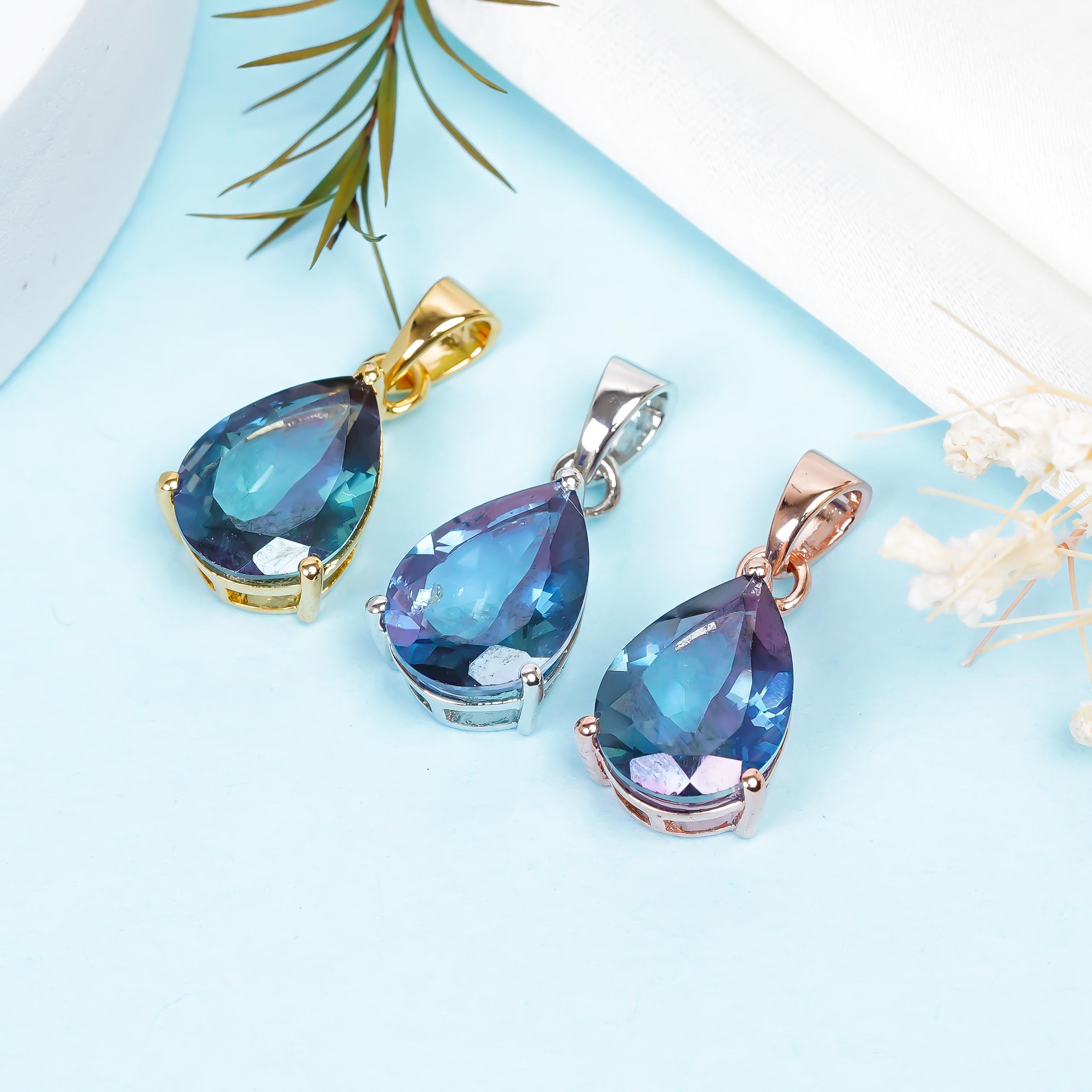 Sterling Silver London Blue Topaz Pendant: Elegant Pear-Shaped Gemstone