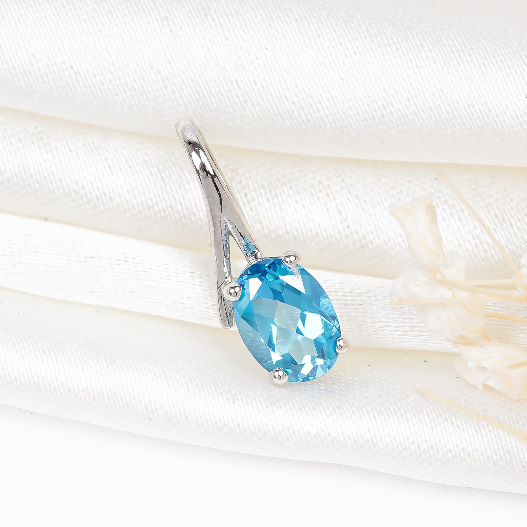 Swiss Blue Topaz Pendant Necklace: Oval Sterling Silver Birthstone