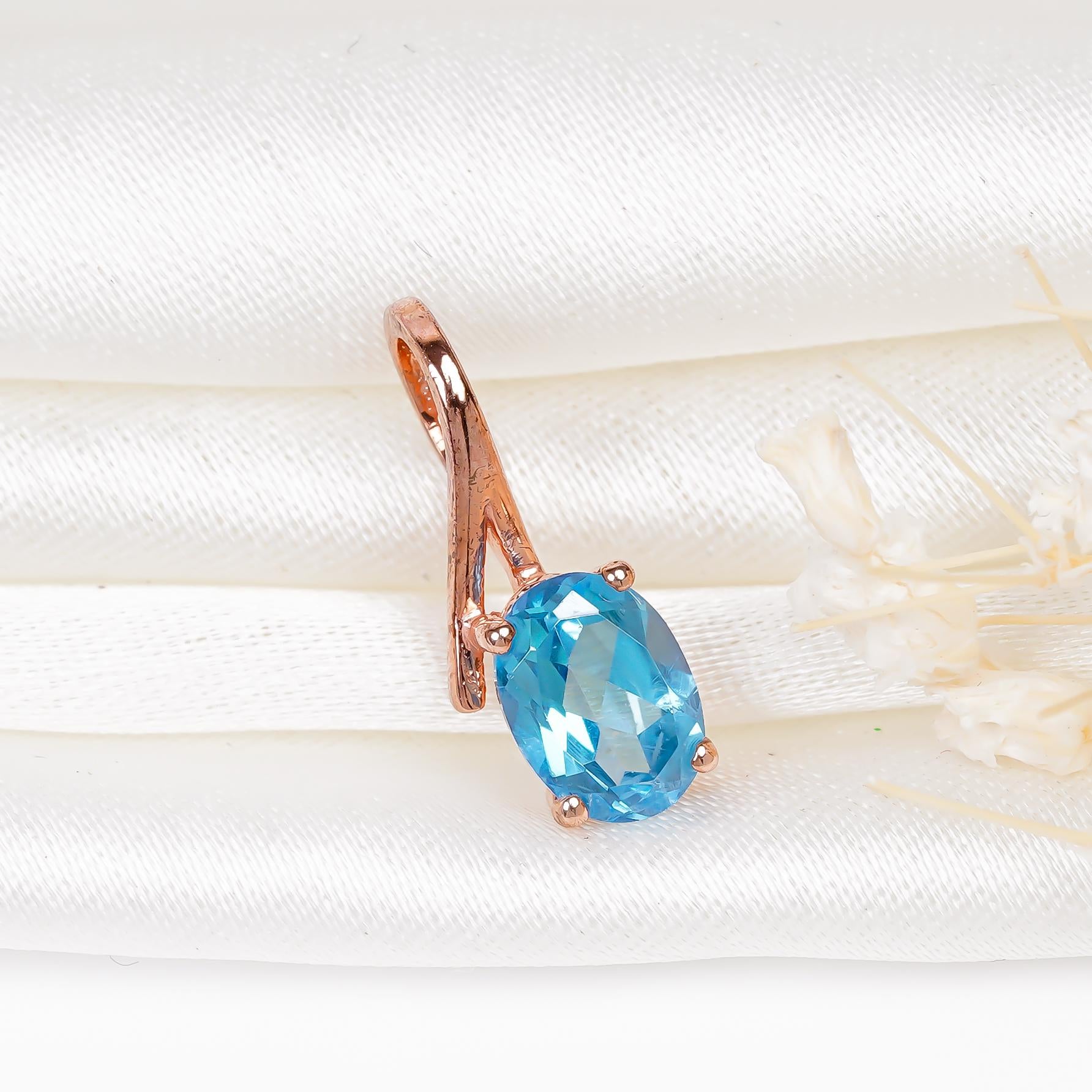 Swiss Blue Topaz Pendant Necklace: Oval Sterling Silver Birthstone