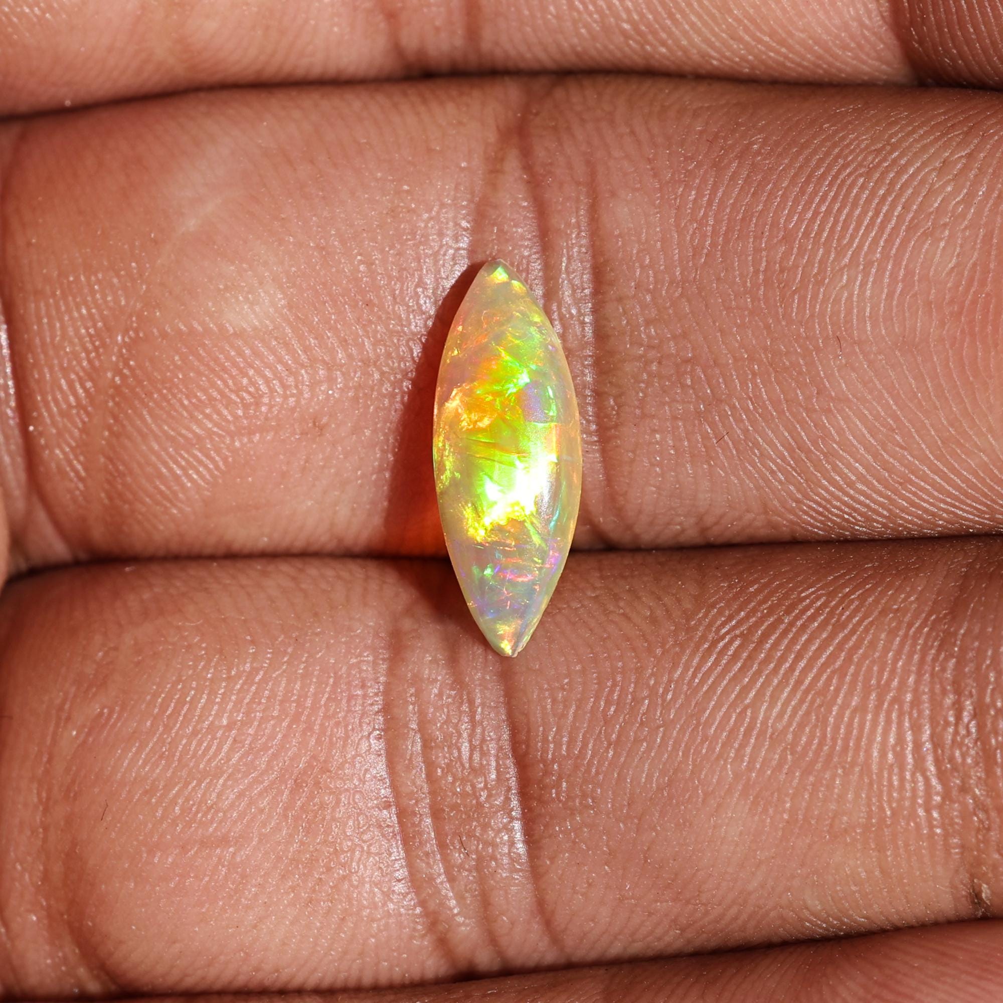 Milky White Ethiopian Opal Gemstone: 1.60 Carat Marquise Cabochon