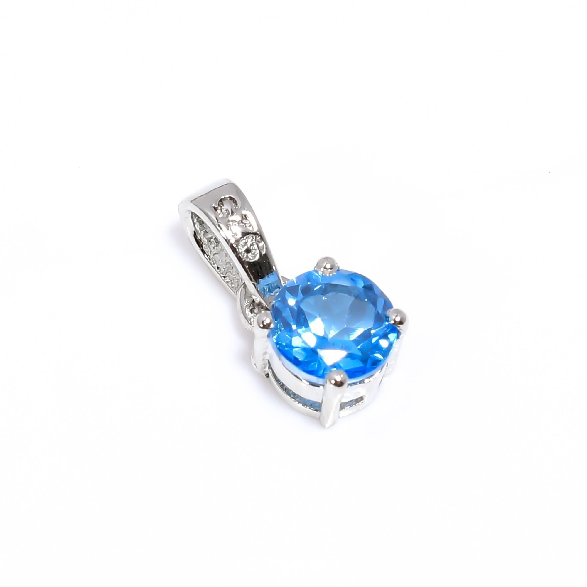 Faceted Swiss Blue Topaz Pendant: Handmade Sterling Silver Necklace