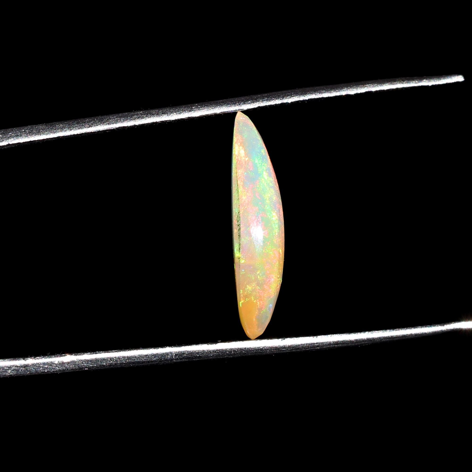 1.56 Carat Marquise White Ethiopian Opal Cabochon: Fire Opal Gemstone