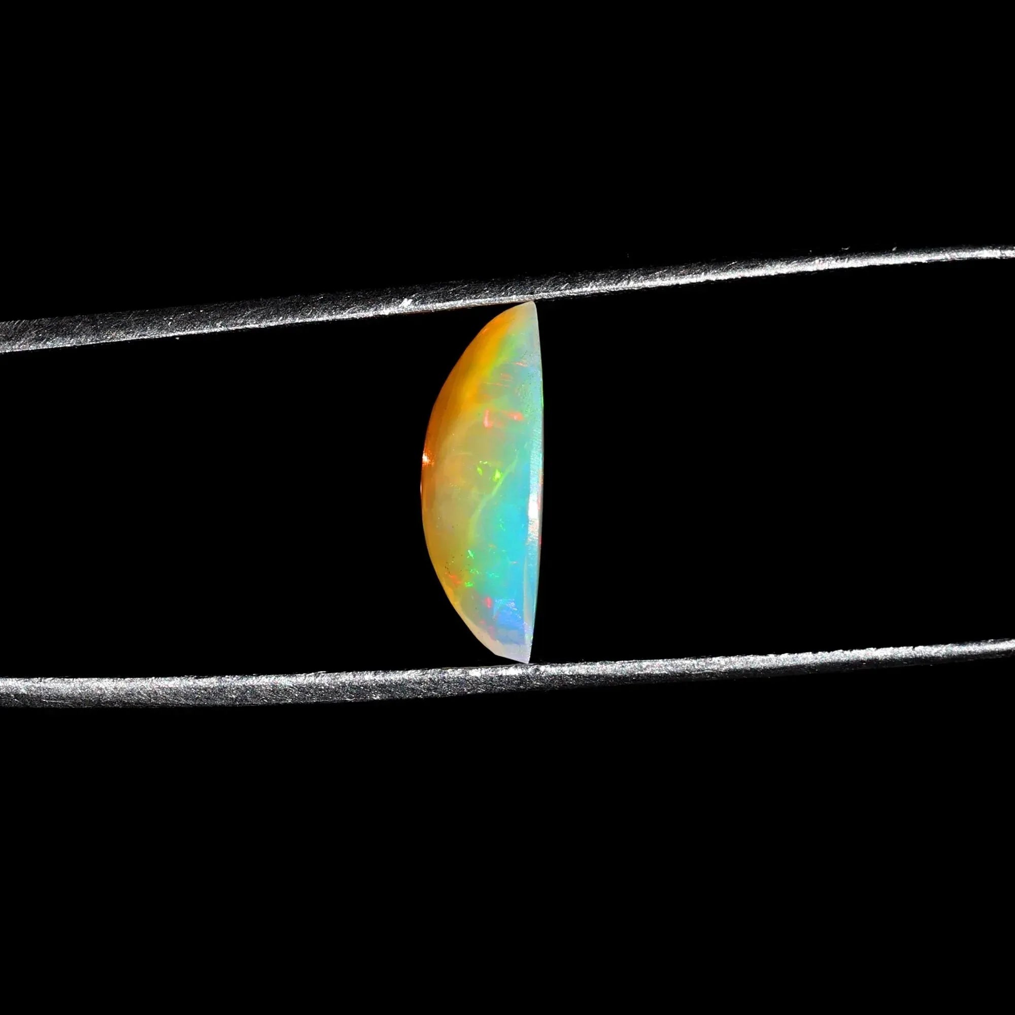 Ethiopian White Opal Cabochon: 1.85 Carat Marquise Fire Opal loose gemstones