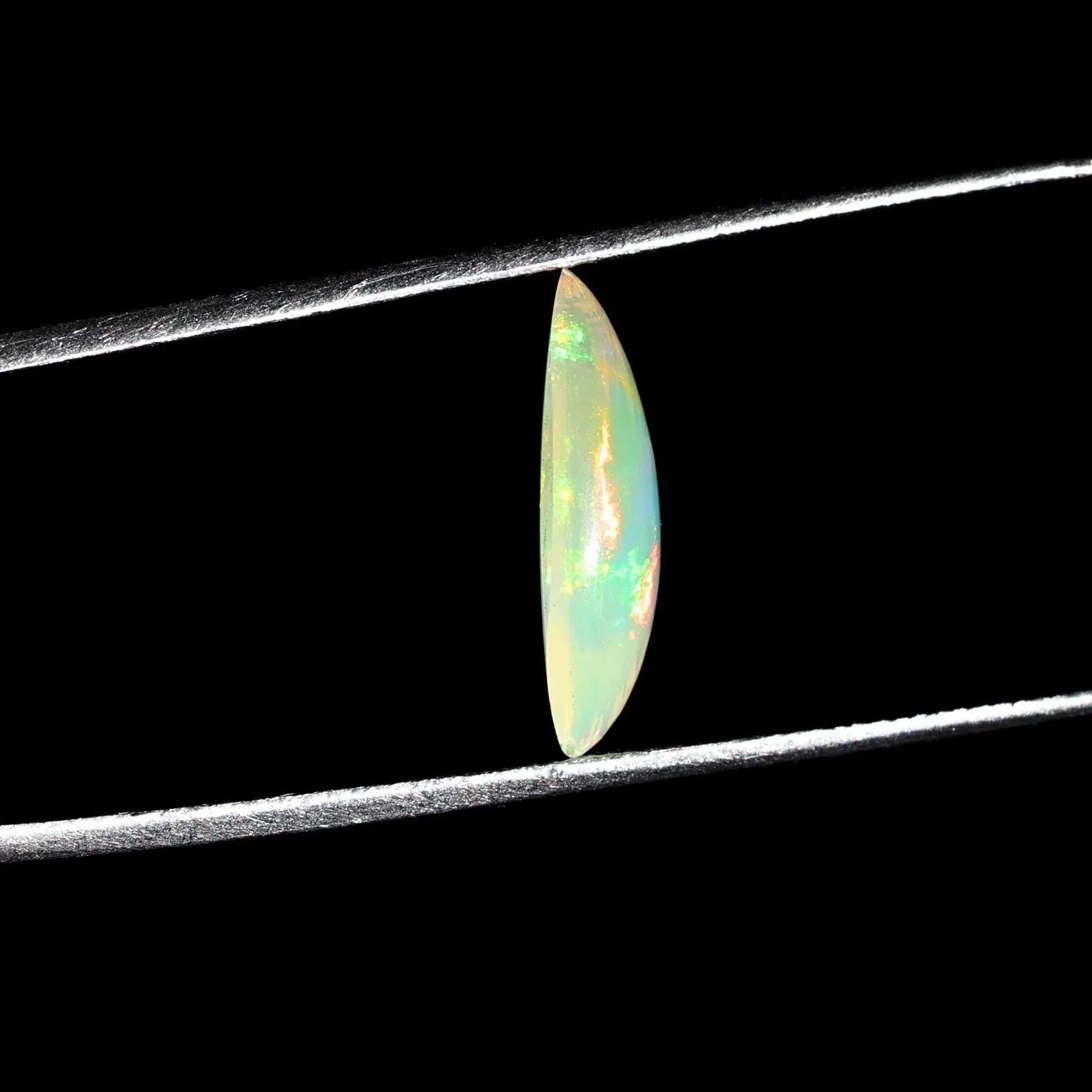 Ethiopian Opal Cabochon: White Marquise Fire Opal (1.35 Carat, 7x15mm) loose gemstones