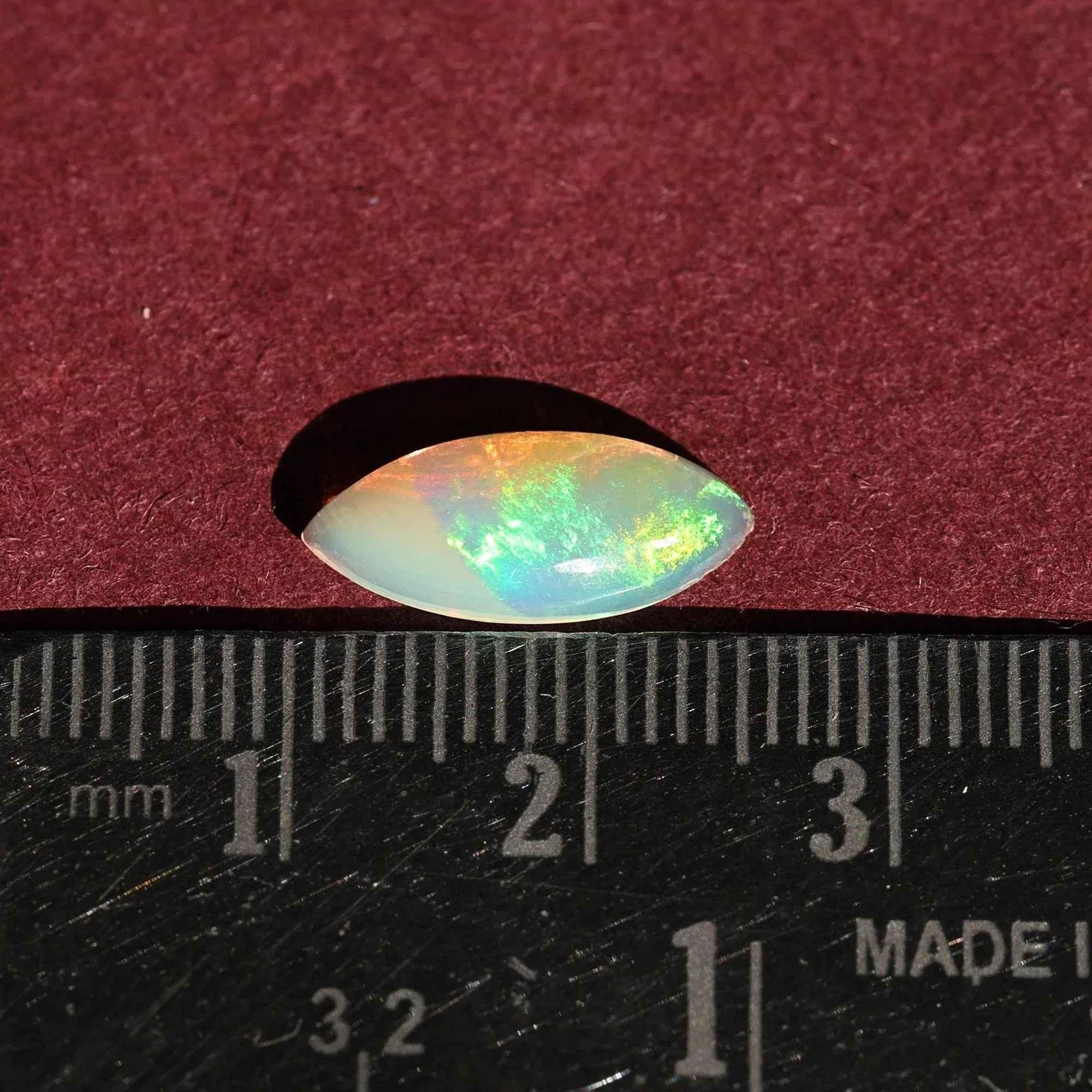 Ethiopian Opal Cabochon: White Marquise Fire Opal (1.35 Carat, 7x15mm) loose gemstones