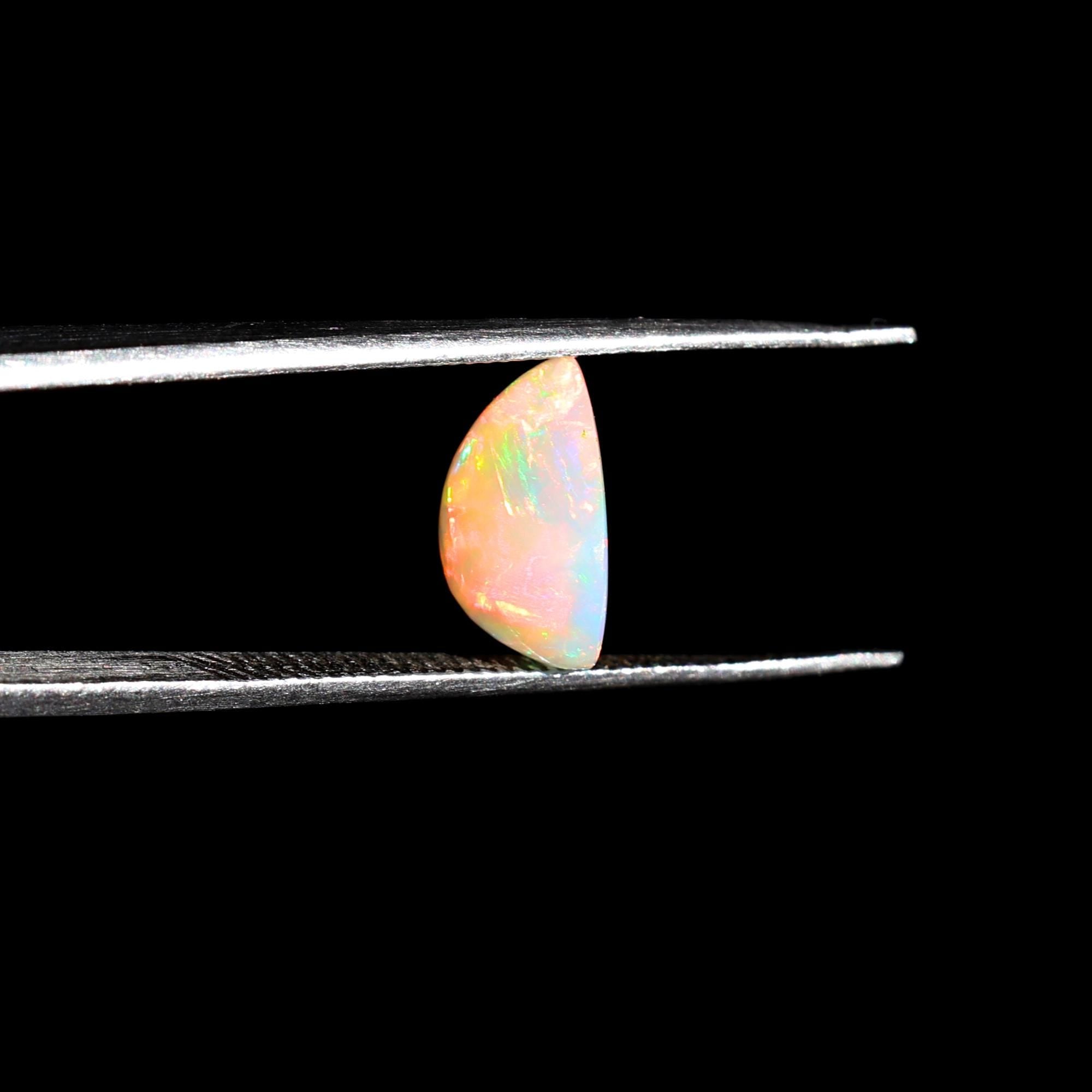 Natural AAA+ Grade White Ethiopian Opal Rainbow Fire Gemstones Opal Wholesale 2.10 Carat