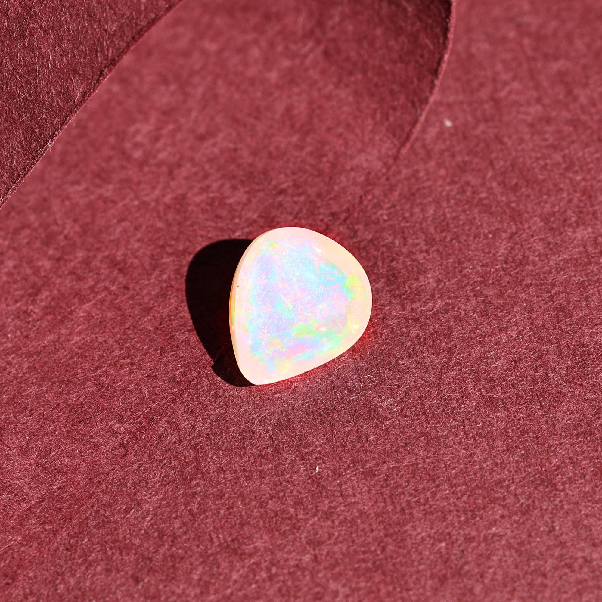 Natural AAA+ Grade White Ethiopian Opal Rainbow Fire Gemstones Opal Wholesale 2.10 Carat