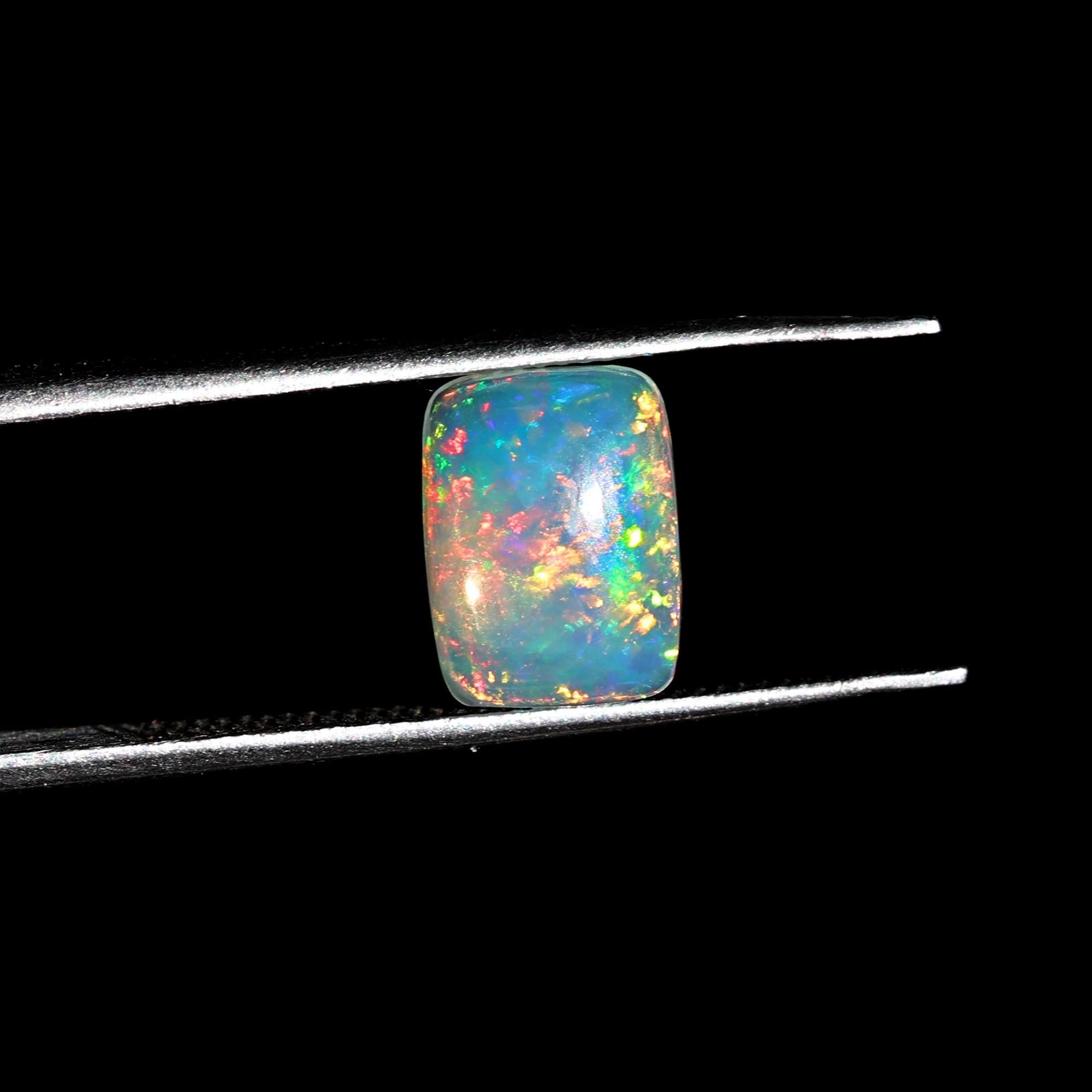 1.40 Carat Ethiopian Welo Opal Cabochon: AAA+ Grade White Fire Opal, October Birthstone