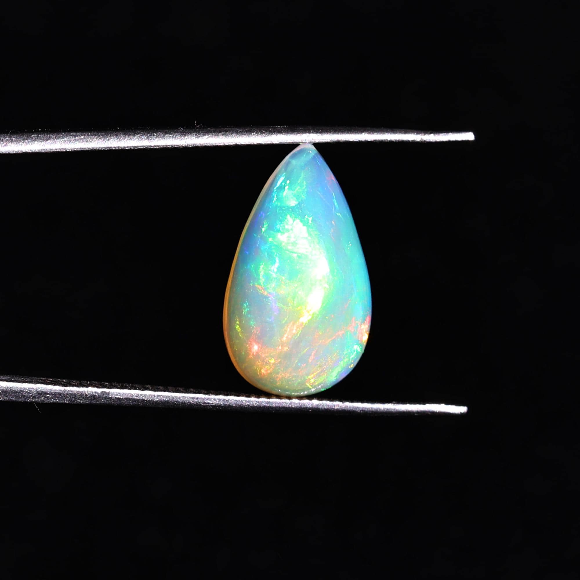 Natural White Ethiopian Fire Opal Cabochon: Pear Shape Loose Gemstone, 3.45 Carat