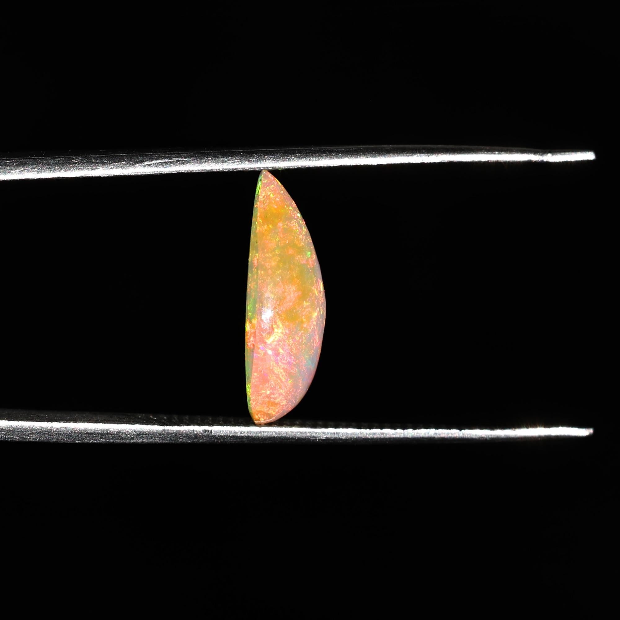 AAA+ Quality White Ethiopian Opal Cabochon: 2.25 Carat Pear-Shaped Gemstone