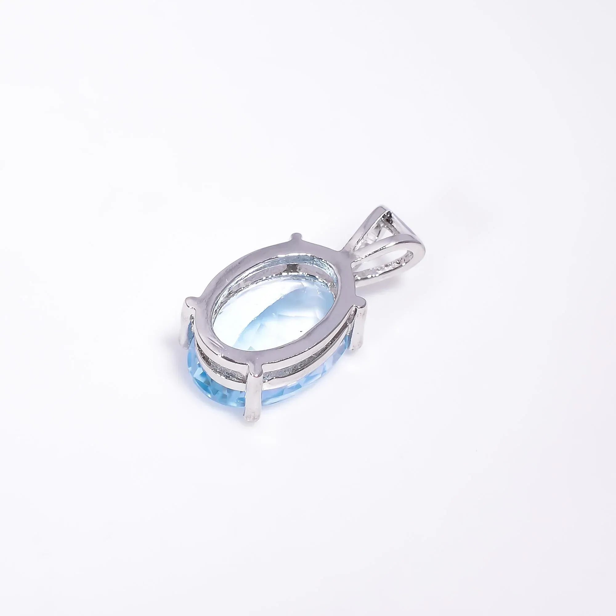 Handmade Oval Swiss Blue Topaz Pendant: Sterling Silver (10x14mm)