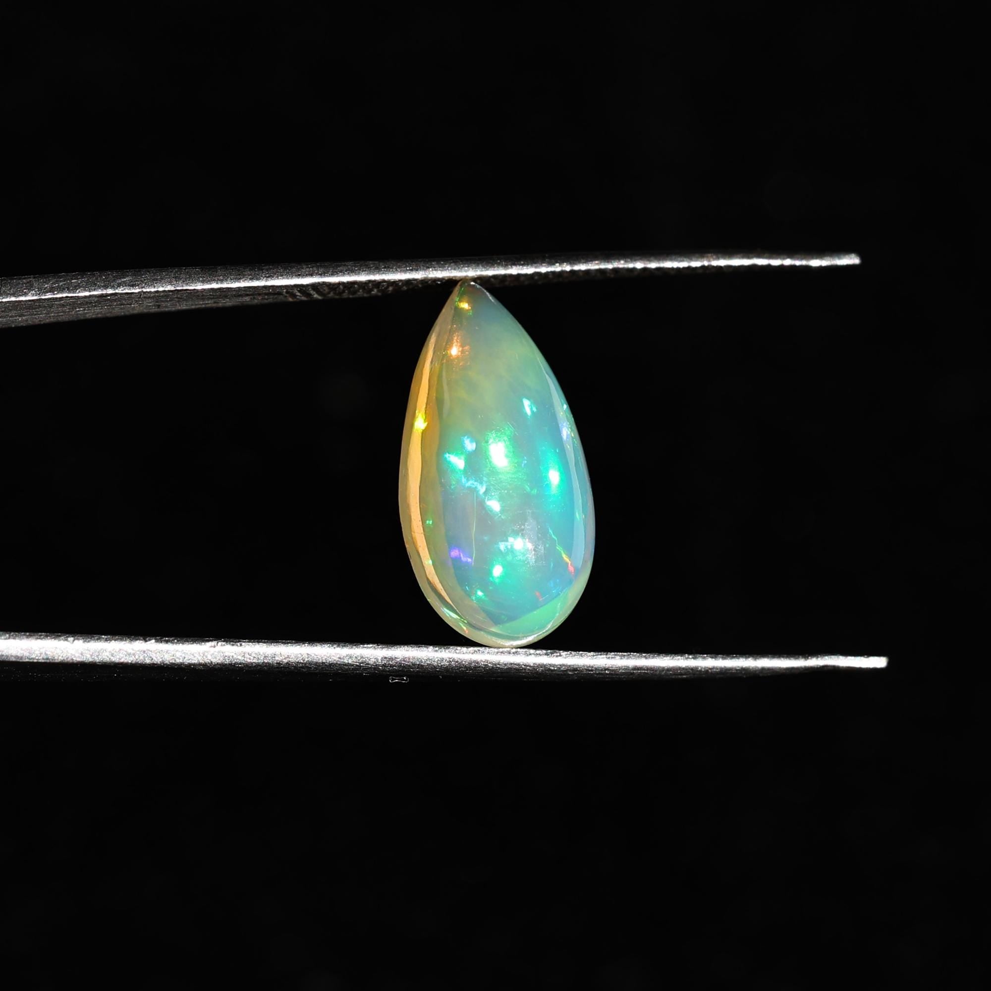 White Ethiopian Opal Cabochon: 3.30 Carat Pear-Shaped Fire Opal Gemstone