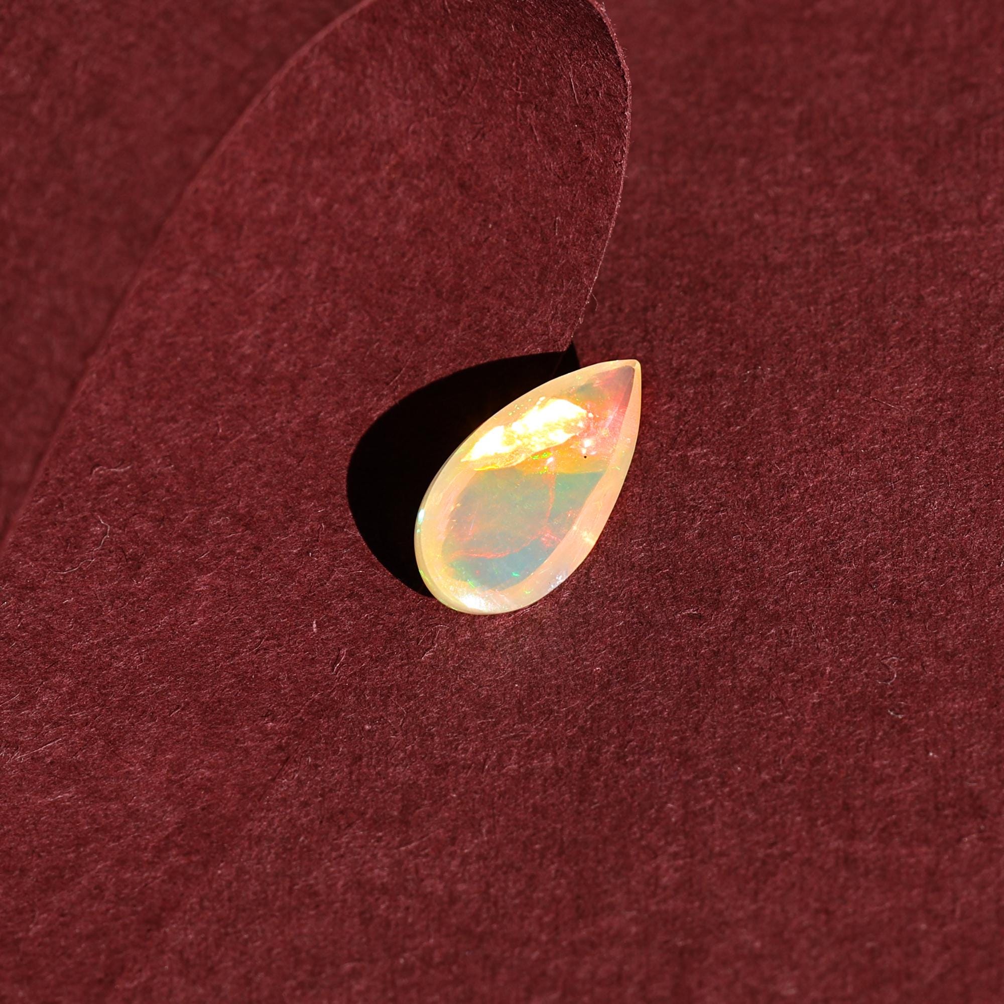 White Ethiopian Opal Cabochon: 3.30 Carat Pear-Shaped Fire Opal Gemstone