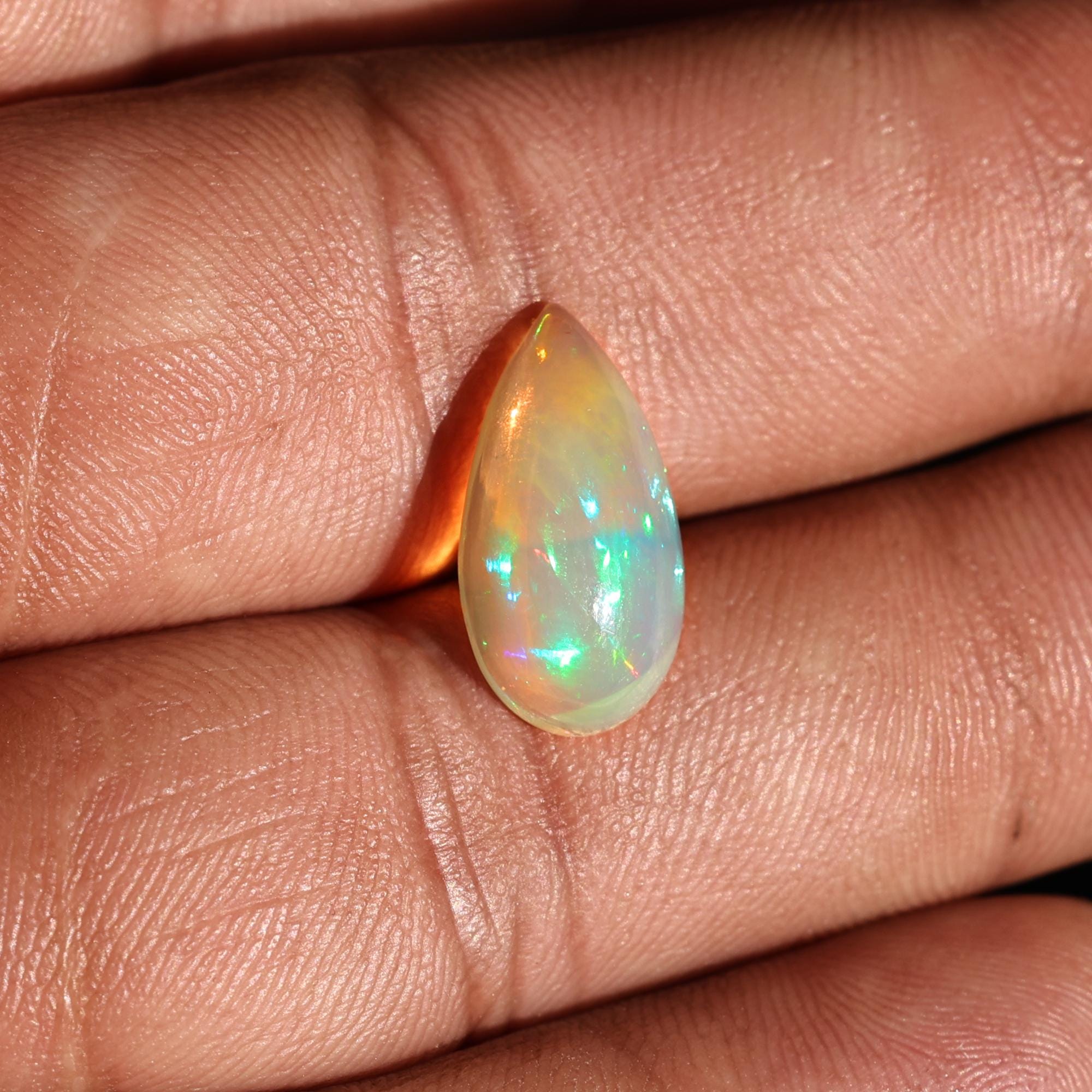 White Ethiopian Opal Cabochon: 3.30 Carat Pear-Shaped Fire Opal Gemstone