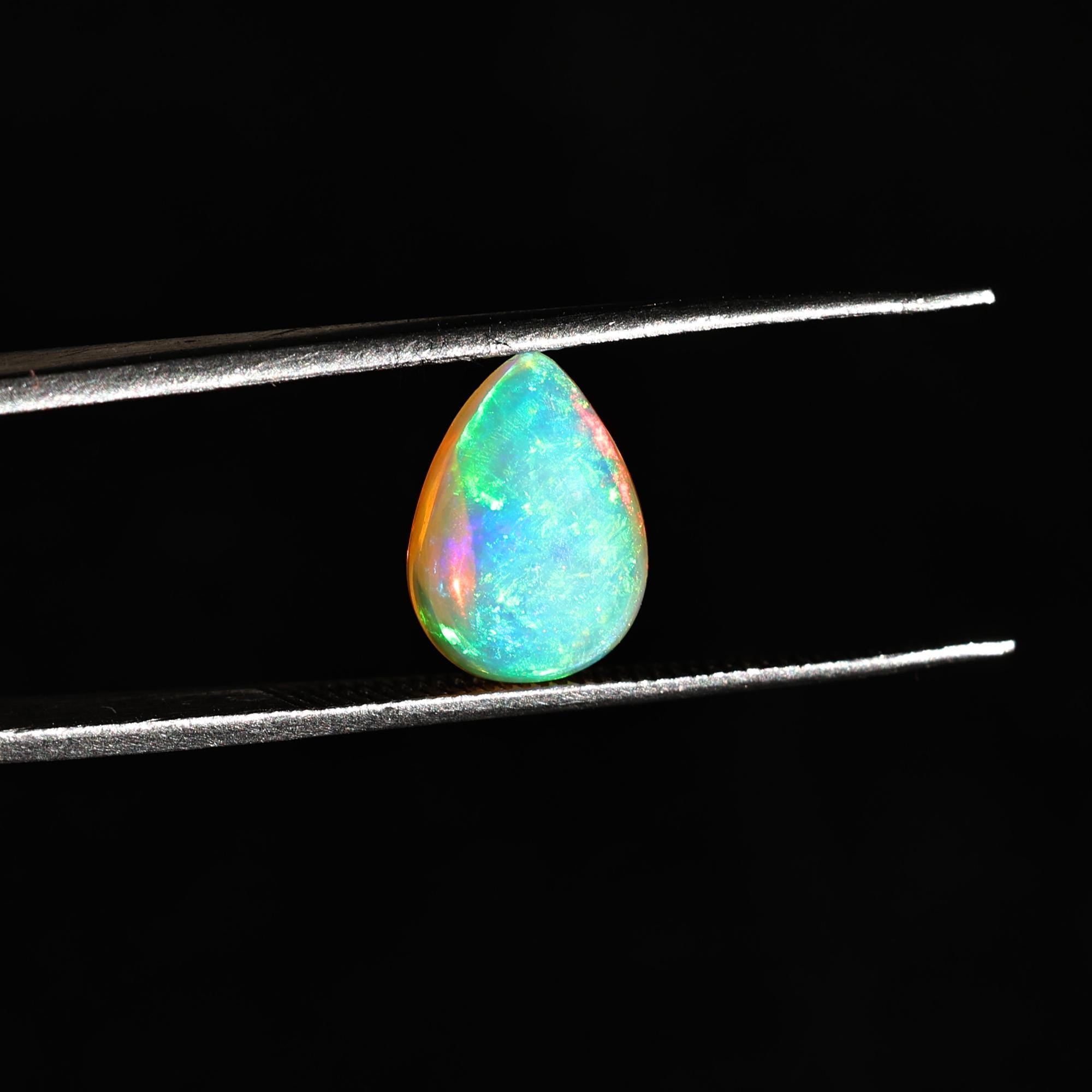 White Ethiopian Welo Fire Opal Cabochon: 2 Carat Pear Cut Gemstone
