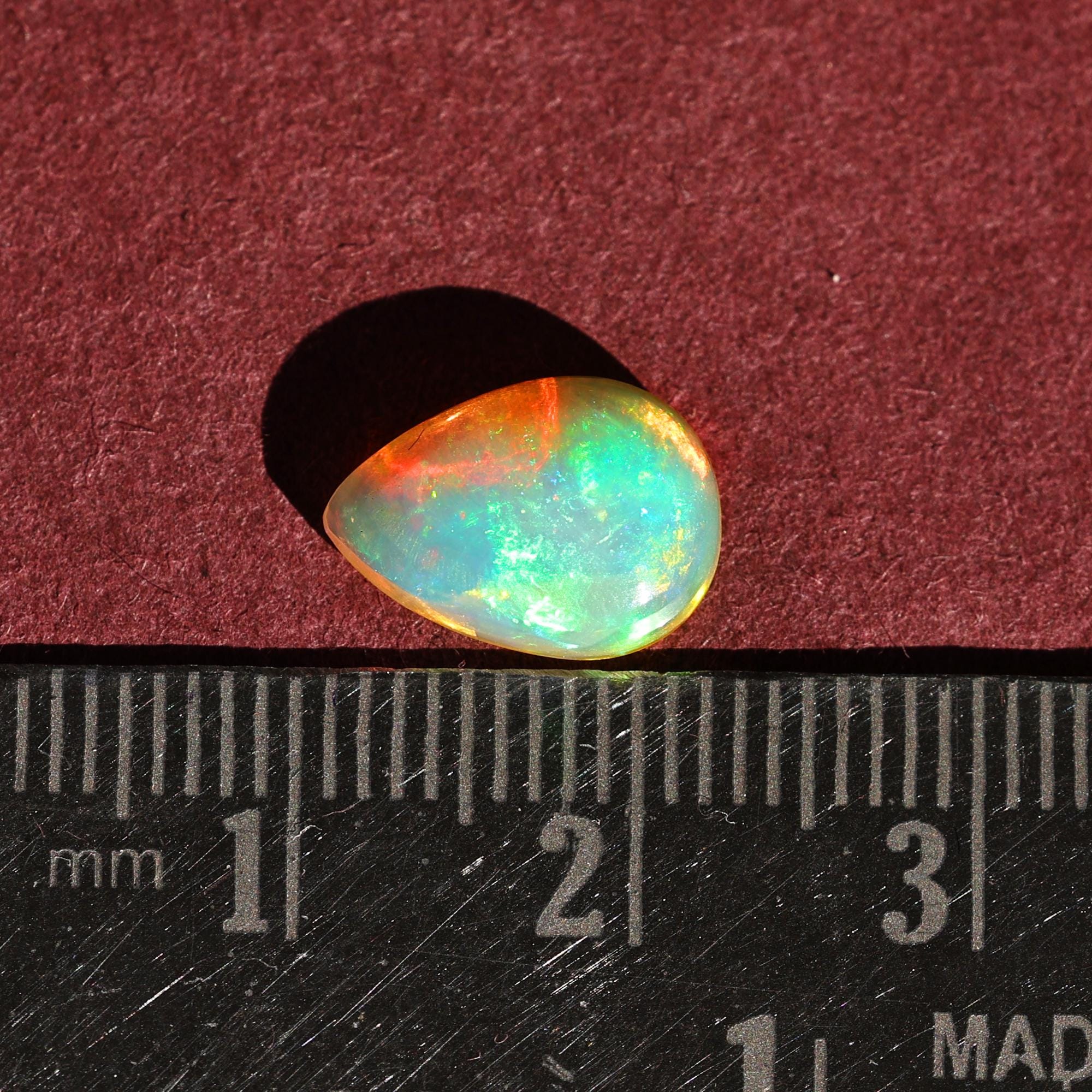 White Ethiopian Welo Fire Opal Cabochon: 2 Carat Pear Cut Gemstone