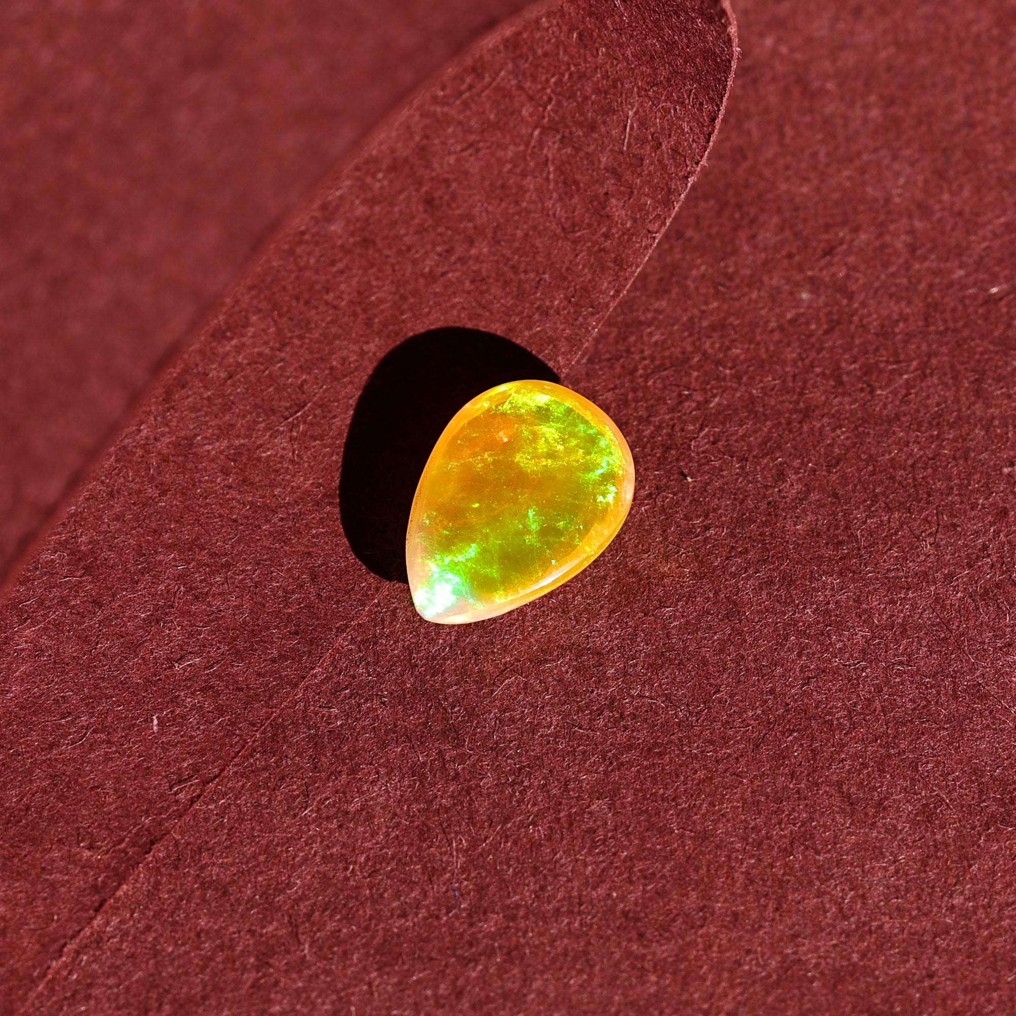 White Ethiopian Welo Fire Opal Cabochon: 2 Carat Pear Cut Gemstone